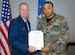 Staff Sgt. Naeem Stanley, 316th Logistics Readiness Squadron, was awarded the Air Force Combat Action Medal, for performing duties while assigned to the 1058th Guntruck Company, Forward Operating Base Speicher, Iraq. During a combat mission, Sergeant Stanley's HUMVEE, which was the lead vehicle in the convoy, struck a landmine. The vehicle was severely damaged and Sergeant Stanley was injured. Sergeant Stanley was awarded the Purple Heart during a ceremony earlier this year. (US Air Force/A1C Renae Kleckner)