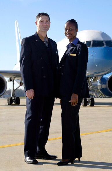 Tech. Sgt. Pete Kana (left) and Staff Sgt. Danyoi Brown are special air mission flight attendants with the 89th Airlift Wing, Andrews Air Force Base, Md.  Sergeant Kana is assigned to the 1st Airlift Squadron. He primarily serves on C-32A aircraft. Sergeant Brown is assigned to the 99th Airlift Squadron and serves primarily on the smaller C-37A aircraft. Though they provide for the overall comfort of their passengers, the top priority of Air Force flight attendants are to ensure the safety of passengers and other crew members on board their aircraft. (U.S. Air Force photo/Master Sgt. Jim Varhegyi)