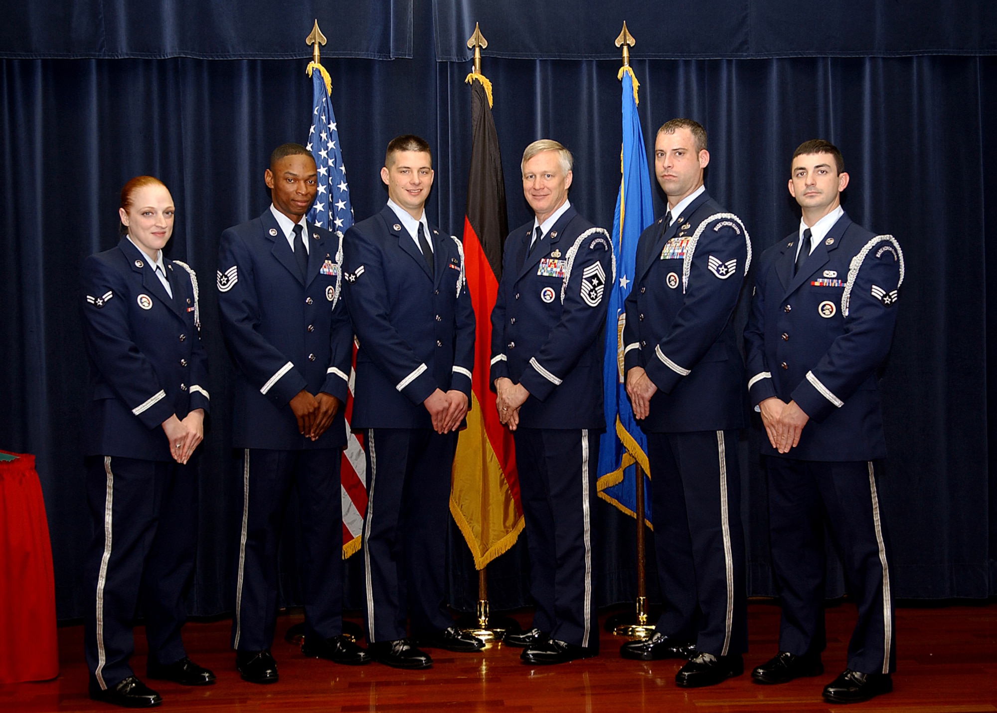 Chief Master Sgt. Vance Clarke, 52nd Fighter Wing command chief, stands in line with members of the Spangdahlem Honor Guard team Oct. 30. Chief Clarke spent the day training with members of the honor guard team to reinforce the importance the duty and encourage supervisors allow their Airmen the ability to participate on the honor guard. (U.S. Air Force photo/Airman 1st Class Allen Pollard) 