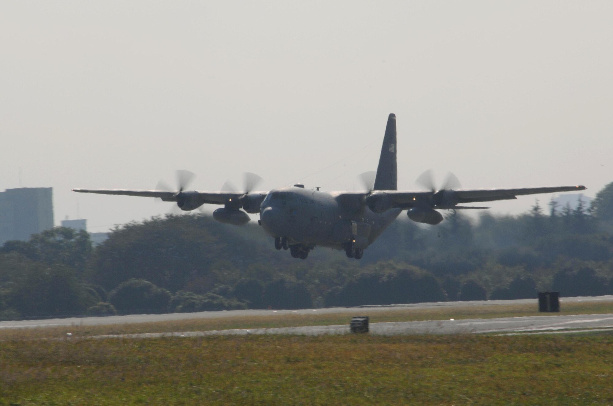 YOKOTA AIR BASE, Japan -- A C-130 begins its aproach on a tough and go drill being performed on October 30, 2007 at Yokota Air Base. (U.S. Air Force photo by A1C Laszlo Babocsi)(Released)