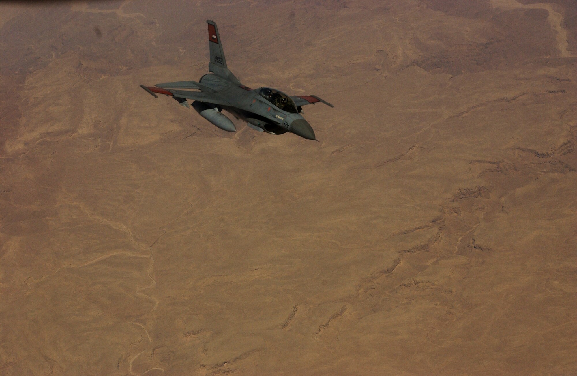 An F-16 flown by the Egyptian Air Force prepares to make contact with the KC-135 from March Air Reserve Base during in flight refueling training. More than 200 F-16s were purchased from the American government over the years by the Egyptian Air Force.   (U.S. Air Force photo by Staff Sgt. Amy Abbott)
