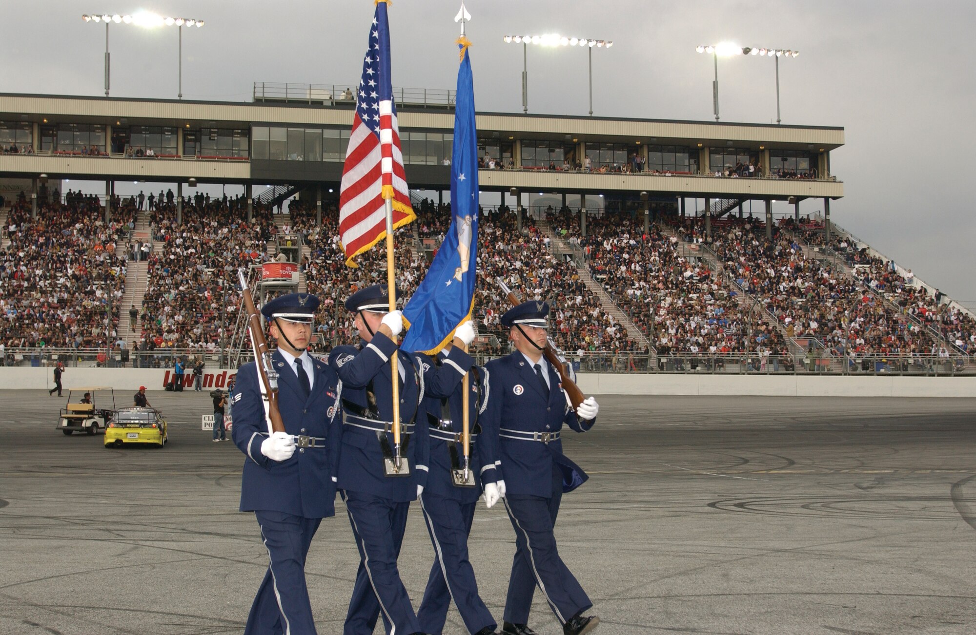 The Blue Eagles Total Force Honor Guard from March ARB performed infront of the massive crowd. (U.S. Air Force photo by Senior Airman David Flaherty)