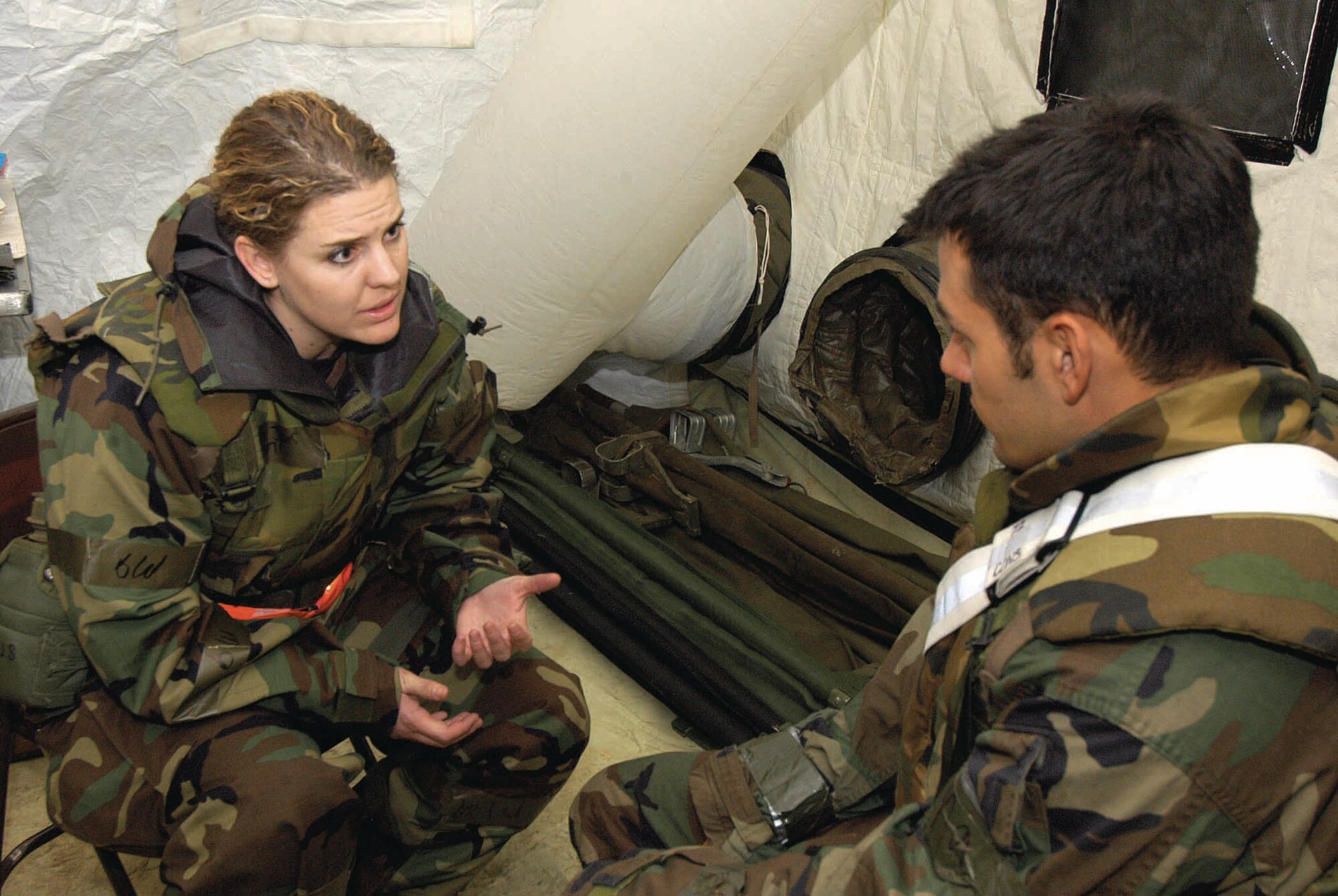 In a Resolute Warrior exercise, mental health technician Staff Sgt. Jennifer Jones talks with an Airman having suicidal thoughts and handling a problem relationship while deployed far from home.  First Lt. Joseph Ahearn plays the distraught Airman during the recent training at Glenwood. (Air Force photo by Margo Wright) 