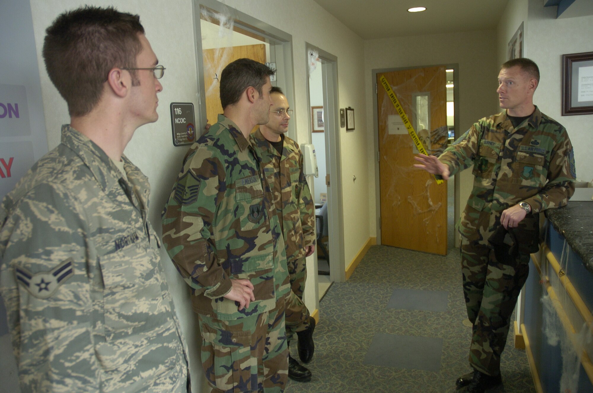 Chief Master Sgt. William Gurney, Ogden Air Logistics Center and 75th Air Base Wing command chief, spends time to visit and speak with Airmen from the 75th Aerospace Medicine Squadron.