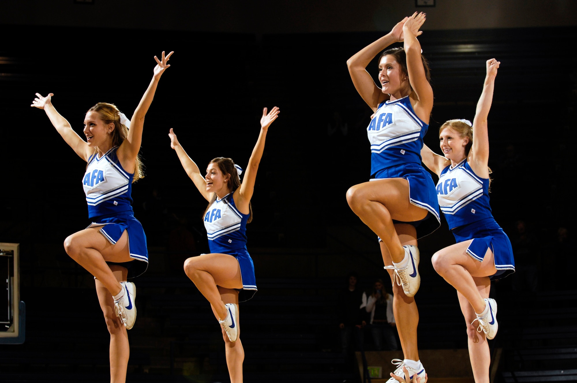 The Blue Spirit Squad cheers during the Air Force vs. Brock University exhibition basketball game at the academy's Clune Arena. Air Force was defeated 66-63 on a last second three-pointer by Rohan Steen of the Badgers. The Falcons open the 2007-08 regular season on Nov. 9 in the Air Force Classic at Clune Arena. (U.S. Air Force photo/Lewis Carlyle)