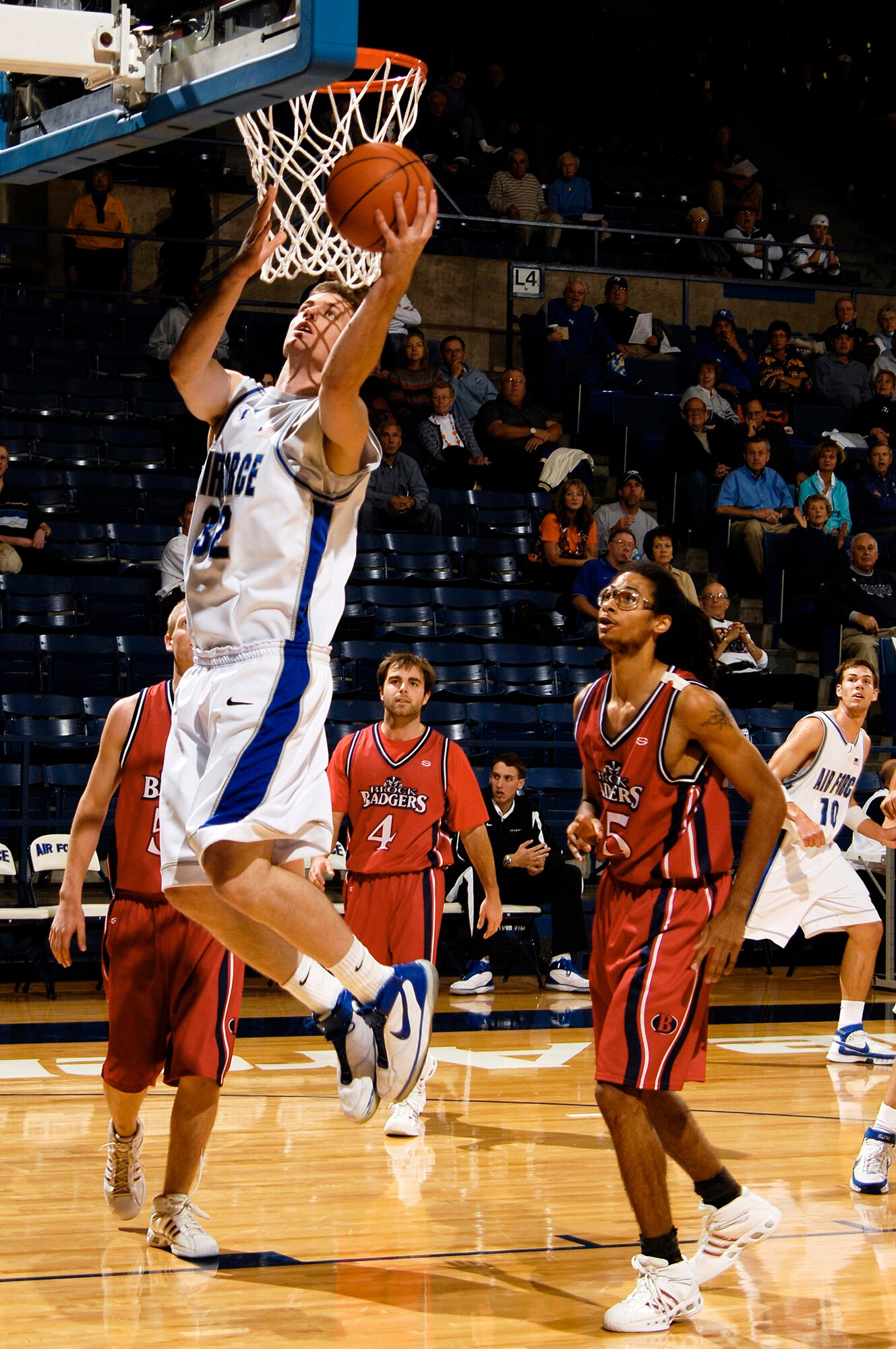 Senior Eric Kenzik goes up for the layup during the Brock University exhibition basketball game at the academy's Clune Arena. Kenziks 11 points were not enough as Air Force was defeated 66-63. The Falcons open the 2007-08 regular season on Nov. 9 in the Air Force Classic at Clune Arena. (U.S. Air Force photo/Lewis Carlyle)