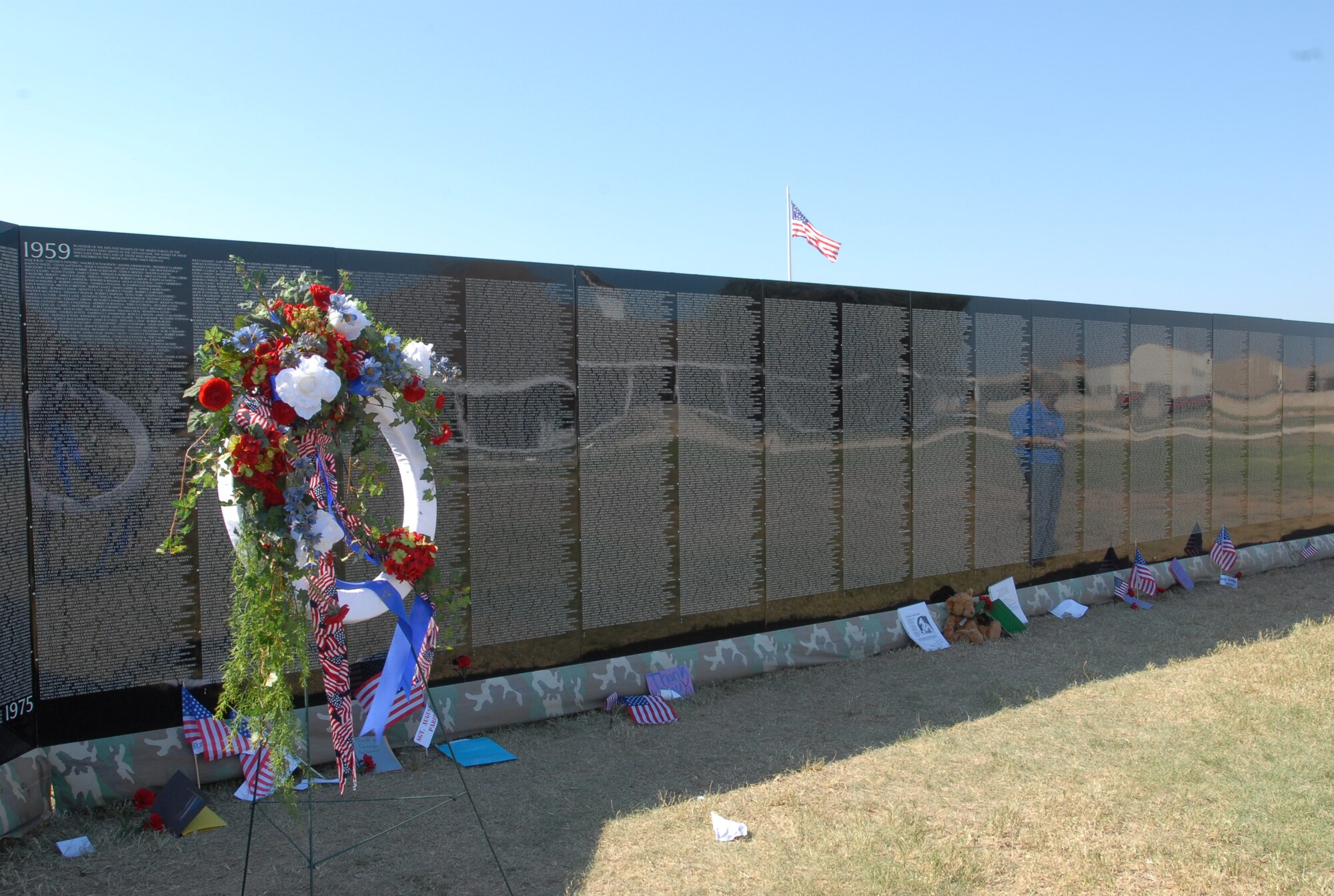 A memorial wreath stands guard over The Moving Wall Oct. 12 at Historic Fort Concho in San Angelo. (U.S. Air Force photo by Staff Sgt. Angela Malek)