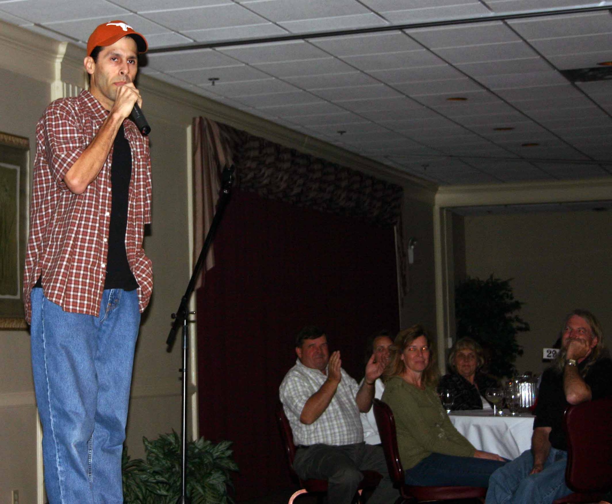 Patrick DeGuire on stage during the show in March. Mr. DeGuire will join Matt Golightly and JR Brow on stage at the Tinker Club Wednesday for this year’s comedy show and dinner. (Air Force photo by Julie Rich)