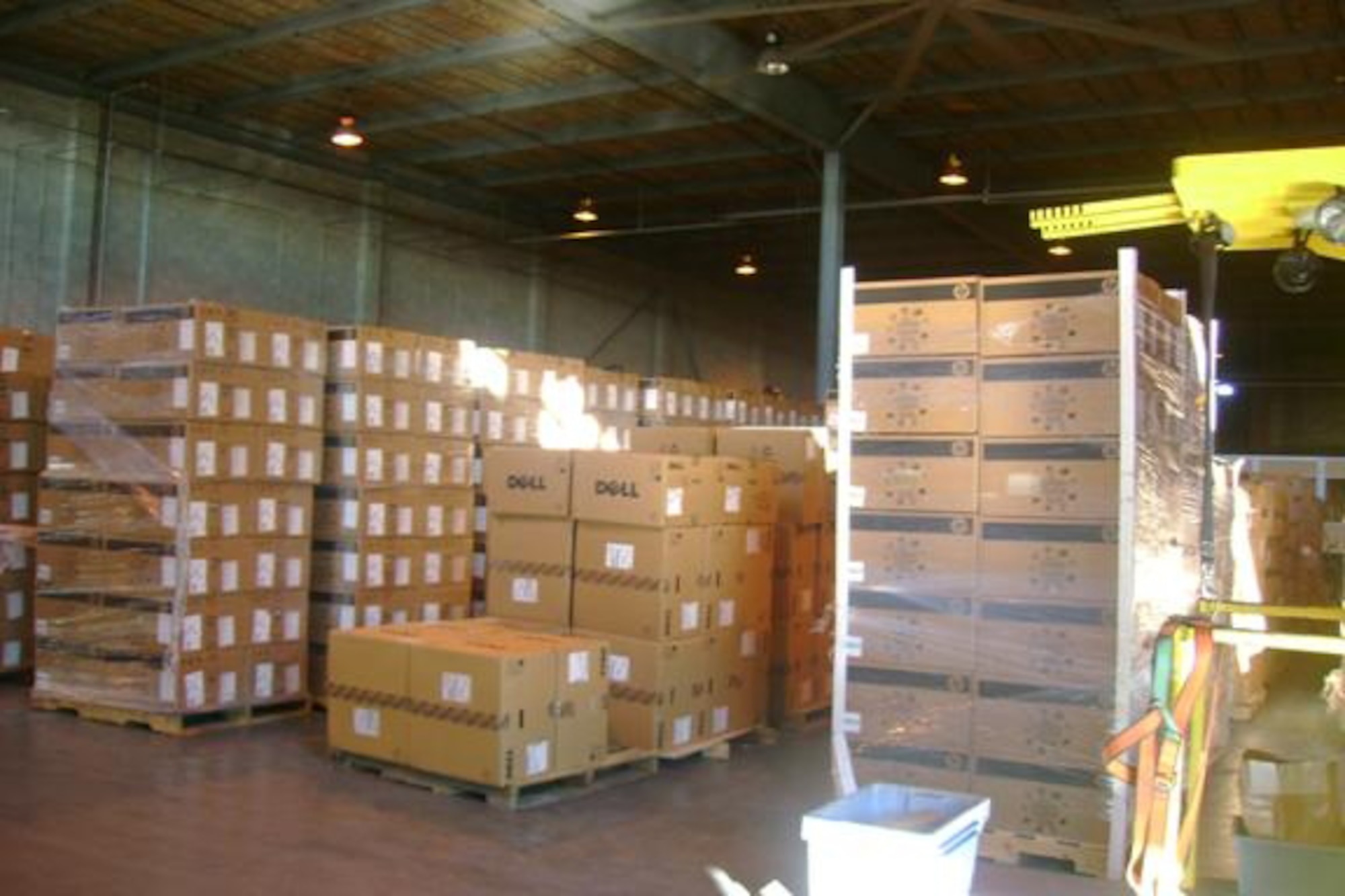 EGLIN AIR FORCE BASE, Fla. -- 1,400 computer desktops, monitors and laptops were centrally delivered and stored in a warehouse here for mass distribution to several organizations with the 96th Air Base Wing. The organizations pooled their resources to make a large consolidated computer equipment purchase using the Air Force Way's End-of-Year Quarterly Enterprise Buy Program. (U.S. Air Force courtesy photo)