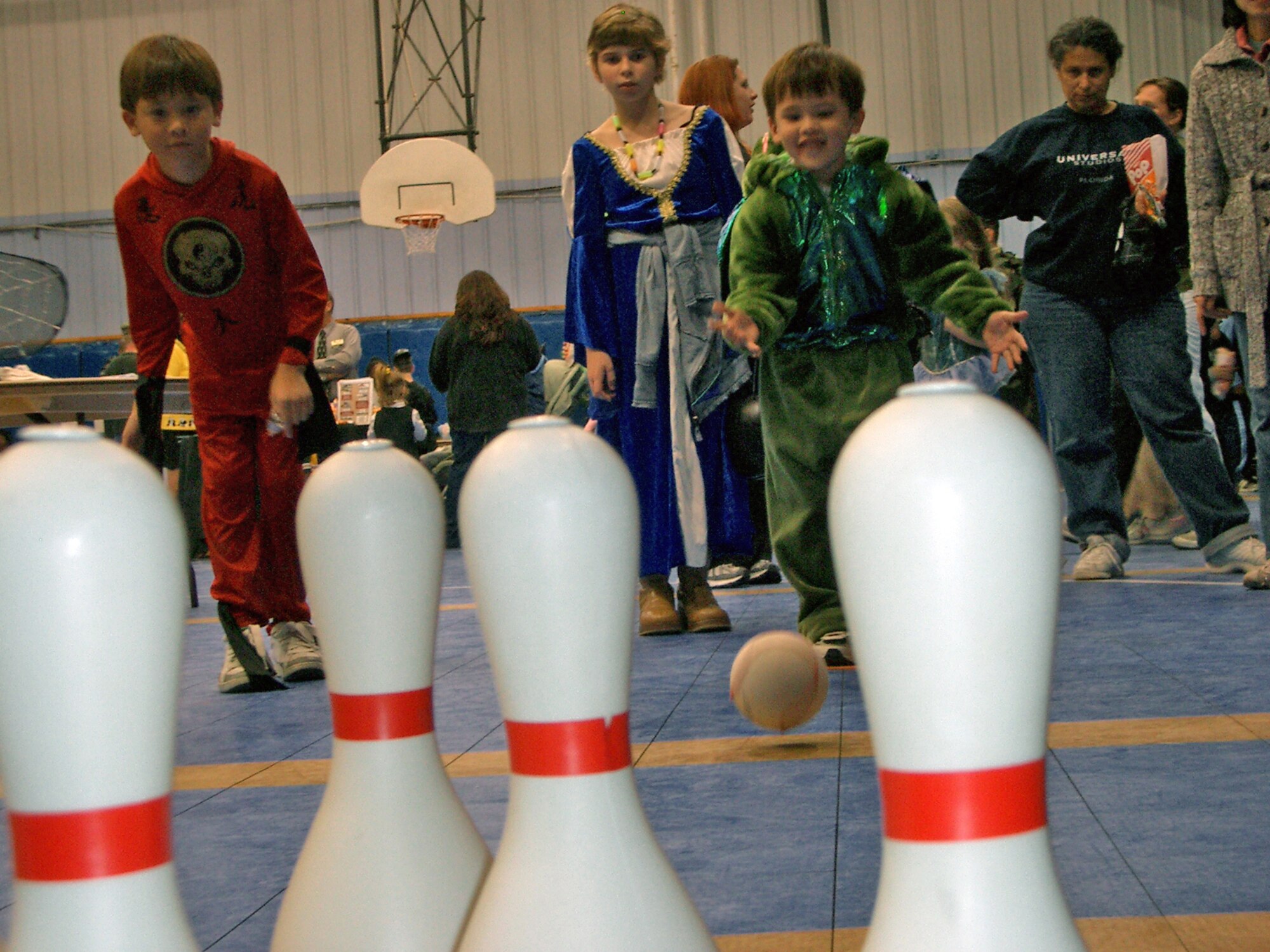 Sean Craig, son of Master Sgt. Kevin Craig, 9th Airlift Squadron, bowls at the Youth Center Wednesday. The Youth Center hosted several games and events for Dover Air Force Base children, which provided variety and additional activities to supplement trick-or-treating. (U.S. Air Force photo/Tech. Sgt. Kevin Wallace)
