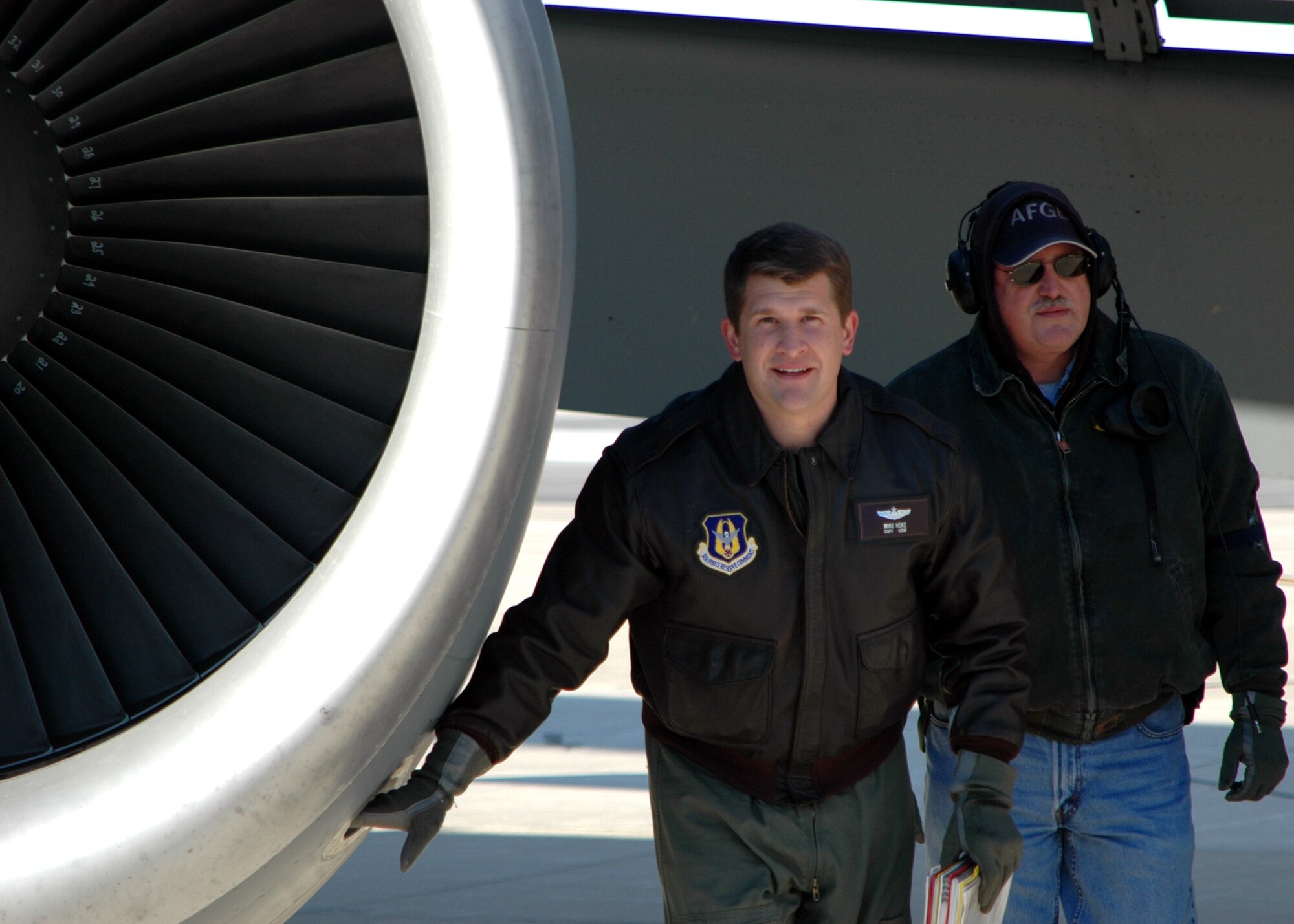 GRISSOM AIR RESERVE BASE, Ind., -- Capt. Mike Hoke, a pilot with the 74th Air Refueling Squadron, performs a final inspection before taking off on an in-flight refueling mission. Many of the KC-135R Strtaotanker's date back to the early 1960's. It is because of constant maintenance and pre-flight inspections that the aircrafts continue to perform well. (U.S. Air Force photo/ Senior Airman Carl Berry)