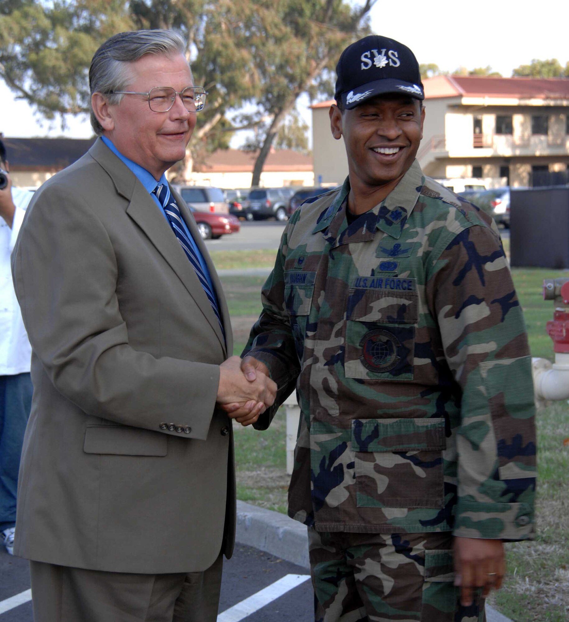 William Uhde, deputy chief, Services Operations Division, Directorate of Manpower and Personnel, Headquarters Air Mobility Command, Scott Air Force Base Ill., is welcomed by Lt. Col. Oscar Vaughn, 60th Services Squadron commander, during the Commander-in-Chief Installation Excellence Award inspection Oct. 31. (U.S. Air Force photo/Jennifer Hamuka)