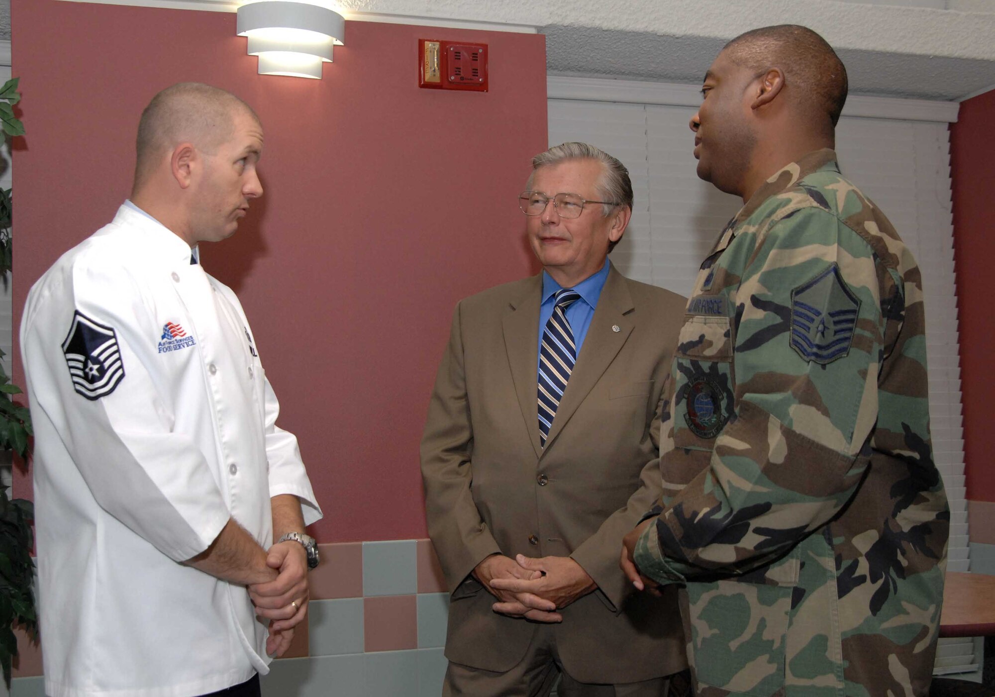 William Uhde, deputy chief, Services Operations Division, Directorate of Manpower and Personnel, Headquarters Air Mobility Command, Scott Air Force Base Ill., speaks with Team Travis members during a breakfast to welcome the Commander-in-Chief Installation Excellence Award inspection team. Travis is one of three bases competing for the award. (U.S. Air Force photo/Laura Fentress)