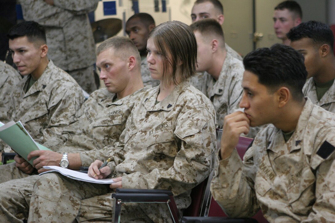 Cpl. Hannah J. Lisowsky, of San Diego, Calif., a 22nd Marine Expeditionary Unit (Special Operations Capable) Command Element administrative clerk, takes notes during a period of instruction of the Corporals? Course class held aboard USS Kearsarge recently. The Marines and sailors of the 22nd MEU (SOC) are on a scheduled six-month deployment. (Official Marine Corps photo by Sgt. Ezekiel R. Kitandwe)