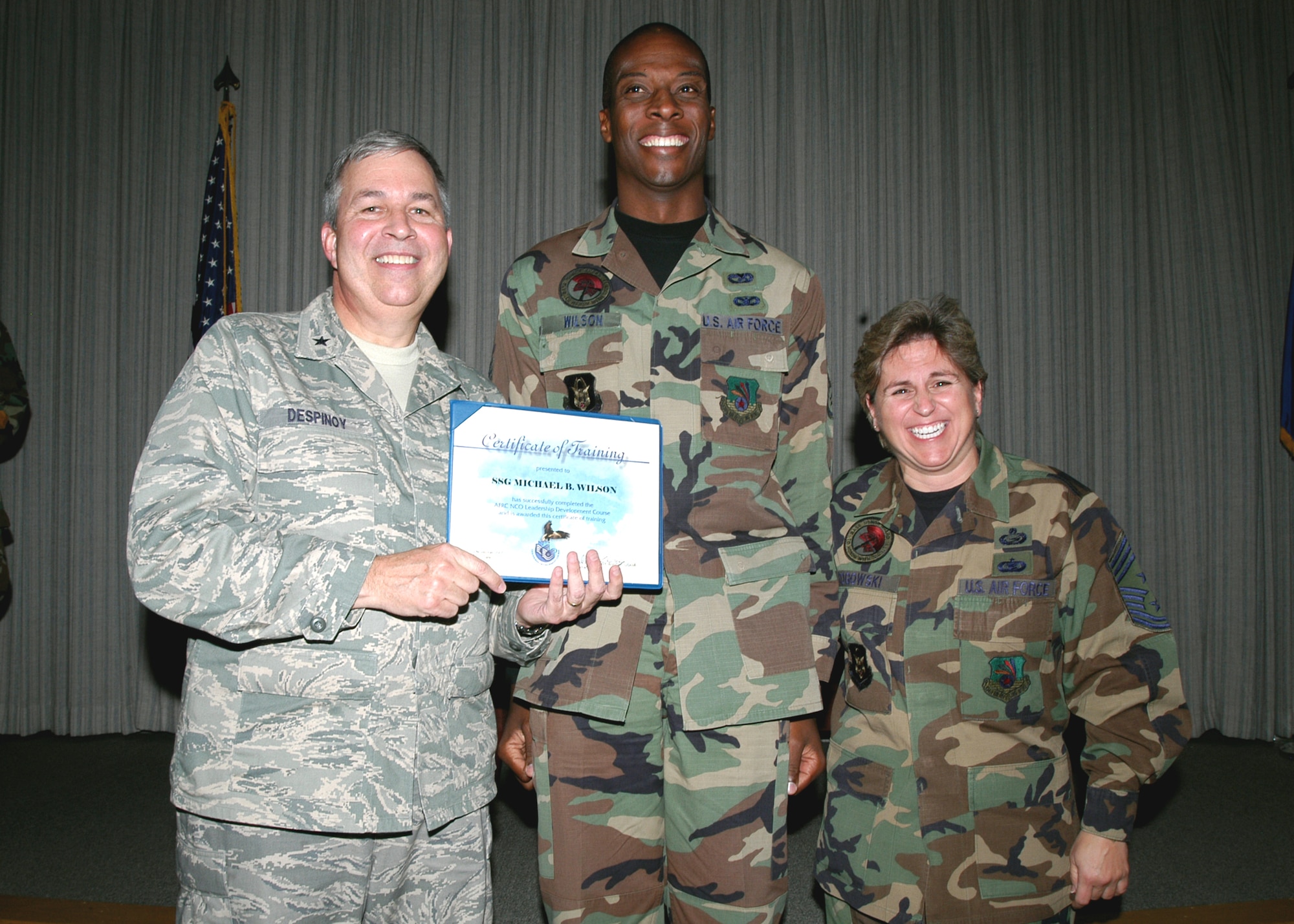 GRISSOM AIR RESERVE BASE, Ind., -- Staff Sgt. Michael Wilson, an information manager with the 434th Operation Support Squadron receives a certificate-of-training for completing the Non-Commissioned Officer Leadership Development Course. There were a total of 15 graduates on Nov. 2. (U.S. Air Force photo/Senior Airman Carl Berry)