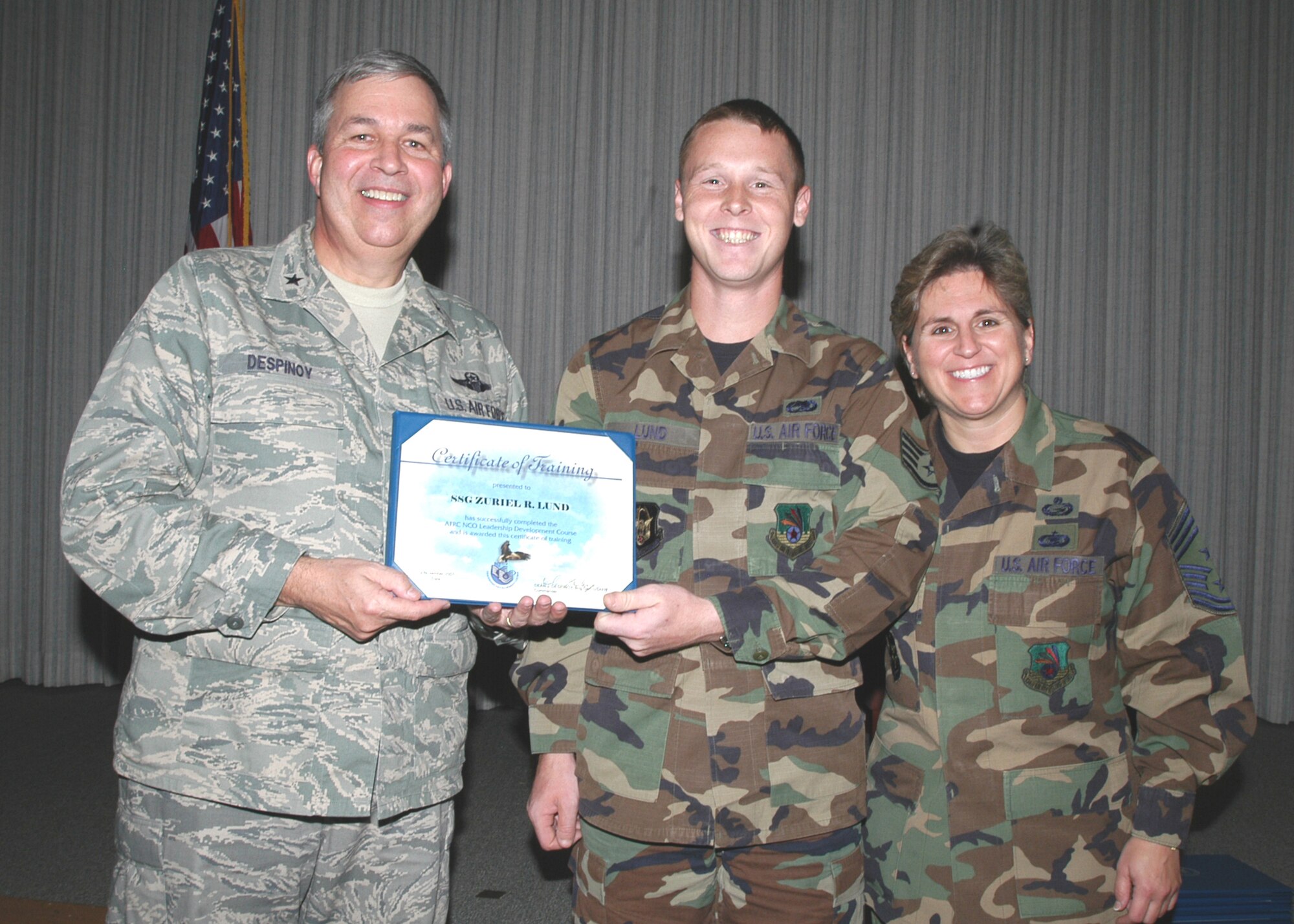 GRISSOM AIR RESERVE BASE, Ind., -- Staff. Sgt. Zuriel Lund, a crew chief for the 434th Air Maintenance Squadron, receives a certificate-of-training for completing the Non-Commissioned Officer Leadership Development Course. There were a total of 15 graduates on Nov. 2. (U.S. Air Force photo/Senior Airman Carl Berry)