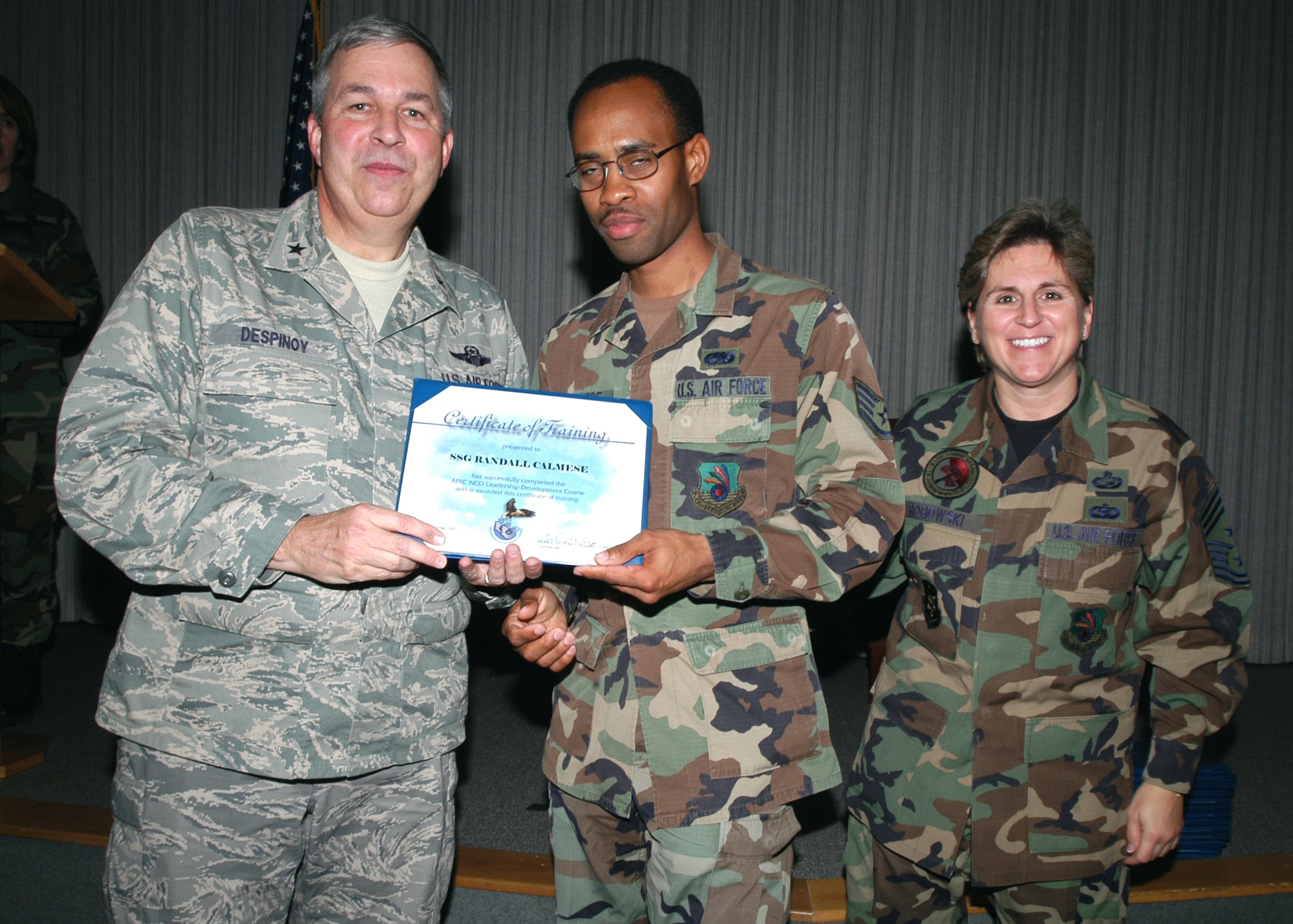 GRISSOM AIR RESERVE BASE, Ind., -- Staff Sgt. Randall Calmese, an information management technician for the 434th Air Maintenance Squadron, receives a certificate-of-training for completing the Non-Commissioned Officer Leadership Development Course. There were a total of 15 graduates on Nov. 2. (U.S. Air Force photo/Senior Airman Carl Berry)