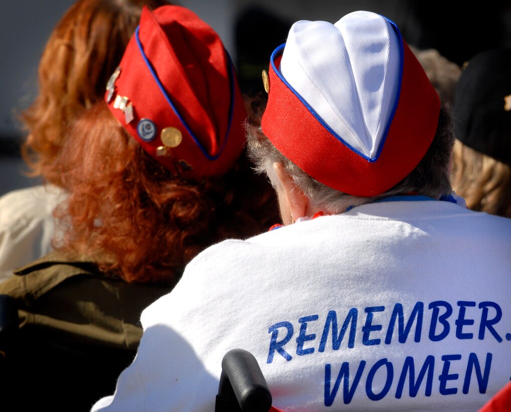 Women veterans wear shirts declaring, "Remember Women are Veterans Too," during the 10th Anniversary Ceremony of the Women's Memorial Dedication at Arlington National Cemetery, Nov. 3, 2007.