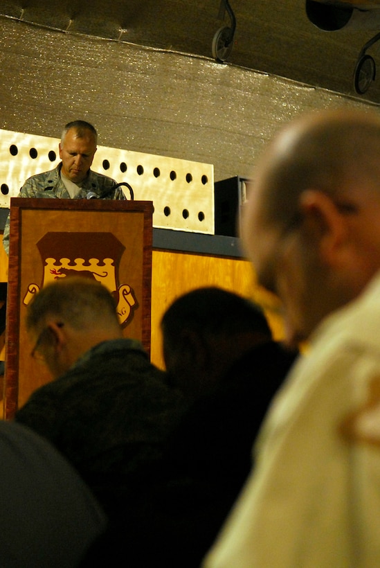 BALAD AIR BASE, Iraq -- Lt. Col. Stephen West, 332nd Air Expeditionary Wing chaplain, gives the invocation during a memorial ceremony here, Nov 4. The memorial ceremony was held to honor three fallen members of the Air Force Office of Special Investigations.  Special Agents Thomas Crowell, David Wieger and Nathan Schuldheiss died Nov. 1, of wounds sustained from an improvised explosive device. (U.S. Air Force photo/Staff Sgt. Joshua Garcia)