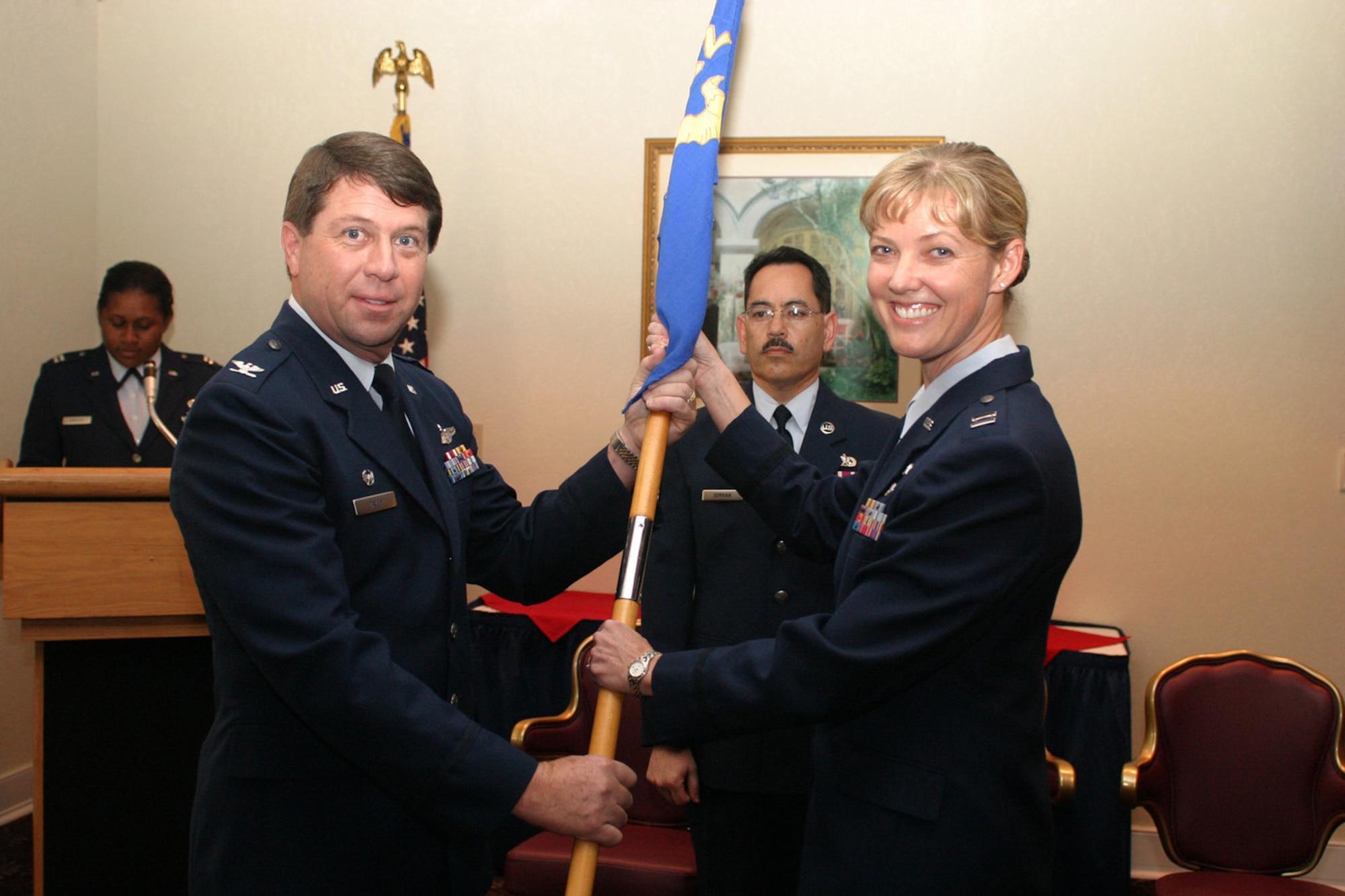The guidon for the 482nd Fighter Wing Mission Support Squadron is passed to Capt. Christy Shaw during an assumption of command ceremony Nov. 3. Special Assistant to the Commander Col. Dennis Daley passed the guidon; the squadron executive officer, Capt. Grace Mickles, served as master of ceremony and the squadron first sergeant, Senior Master Sgt. Anthony Servian is in the center. Capt. Shaw served as executive officer to the 482nd Fighter Wing Maintenance Group before accepting her first command assignment. (Air Force photo/Tech. Sgt. Paul Dean)
