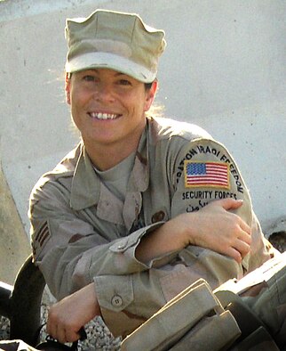 Reserve Airman Diane Lopes, a security forces specialist with the 920th Rescue Wing, was deployed to Kirkuk Air Base, Iraq only four weeks before being wounded in a rocket attack. Now recovering at Walter Reed Army Medical Center, Md., the Tampa resident joined the 920th two years ago and has no plans to leave. The attack, she said, won't chase her away. "It's not going to keep me from doing this," she said of her job as a reservist. (Courtesy photo)