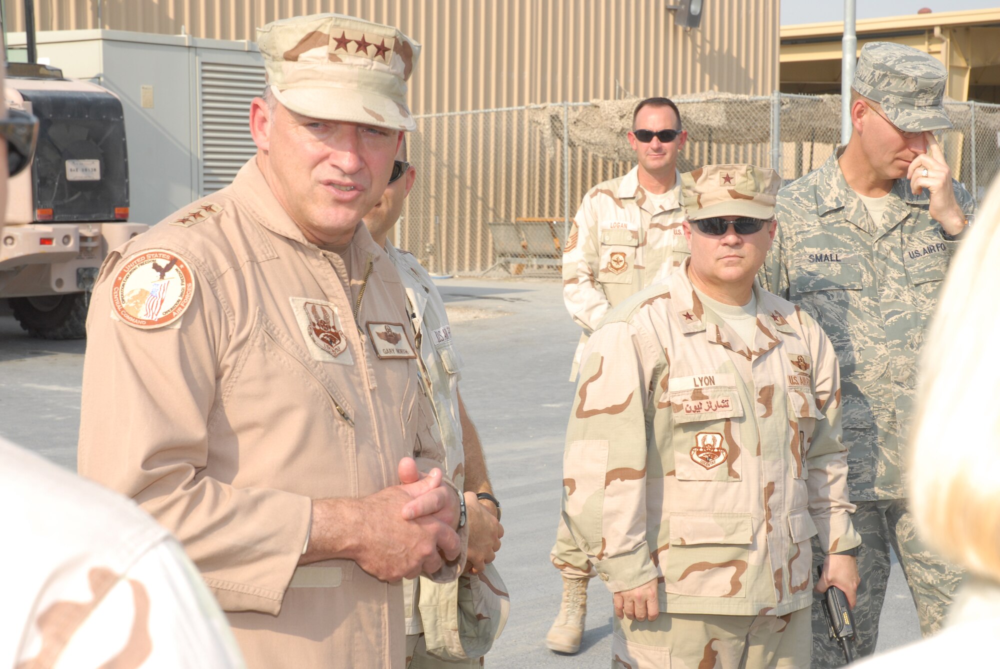 Lt. Gen. Gary North, commander 9th Air Force and U.S. Central Command Air Force, Shaw Air Force Base, South Carolina and Brig. Gen. Charlie Lyon, commander 379th Air Expeditionary Wing, visit with 379th AEW Airmen during his visit to the wing recently.