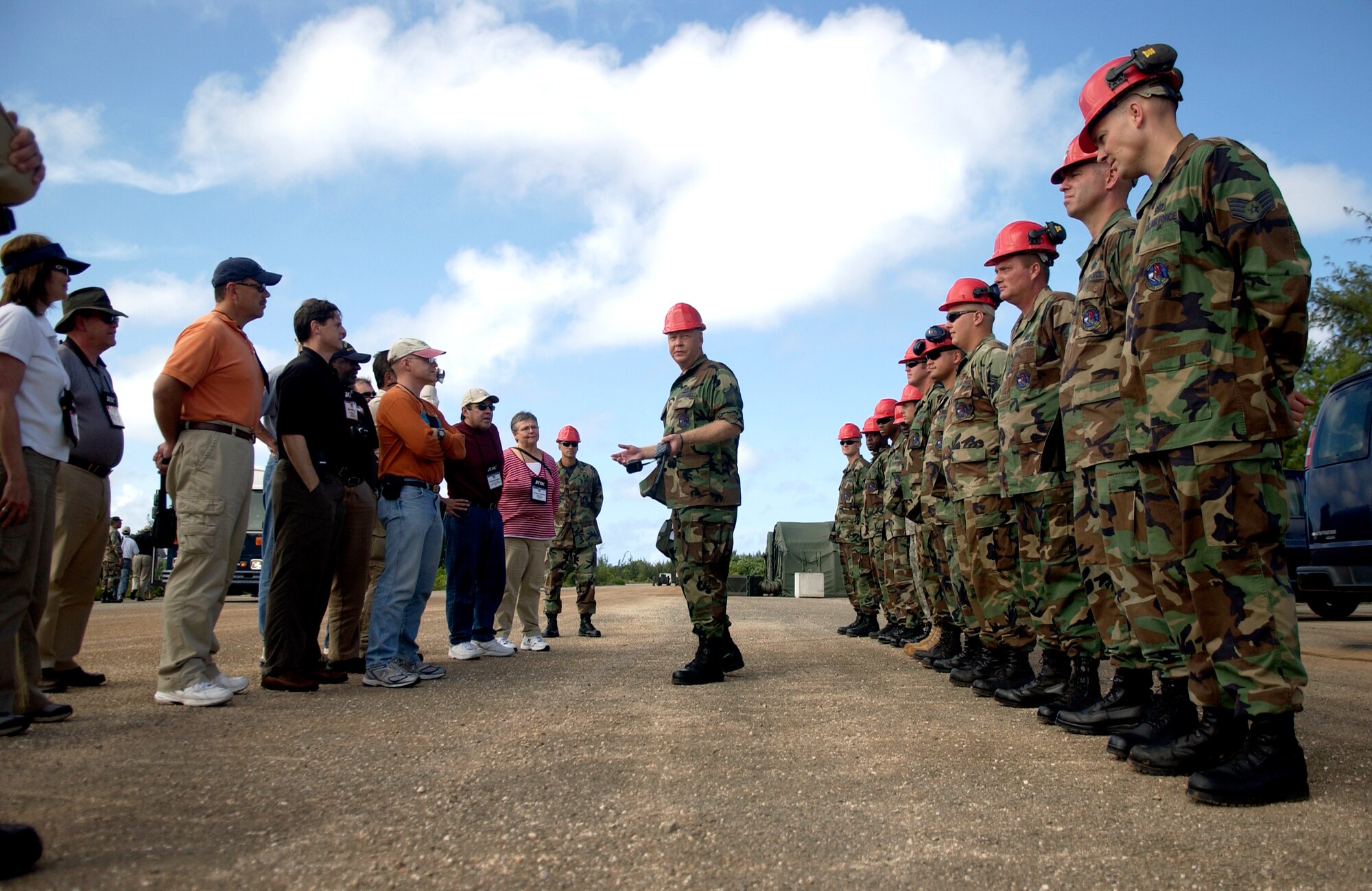 Members of the Joint Civilian Orientation Conference Meet with the 554th RED HORSE Squadron at Northwest Field during their visit to Andersen Nov. 6.  The JCOC tour of the Pacific was scheduled for Nov. 4 through 11. (U.S. Air Force photo/Senior Airman Miranda Moorer)                                        