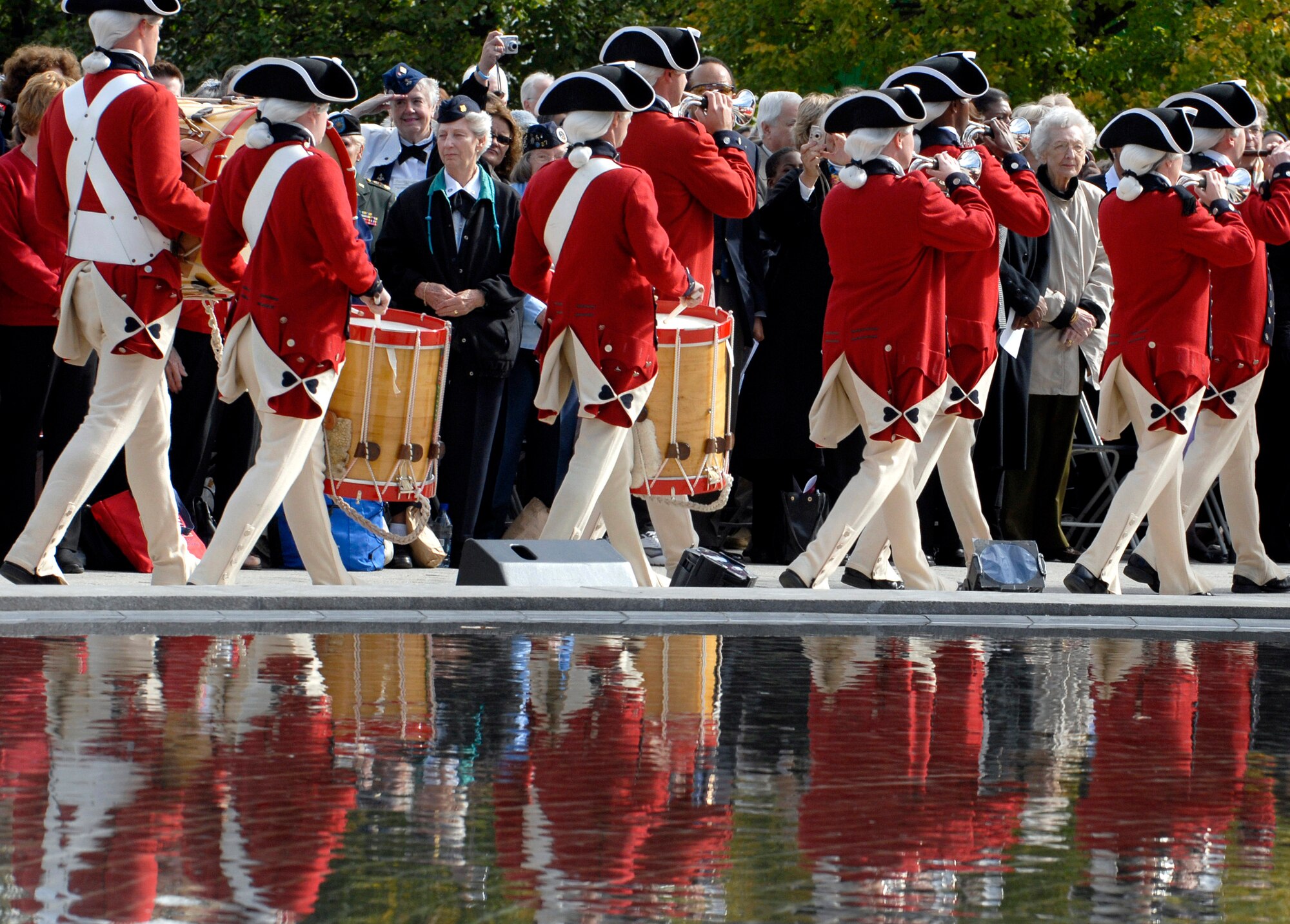 The U.S. Army Old Guard Fife and Drum Corps and the Armed Forces Color Guard post the colors during the ceremony Nov. 3 celebrating the 10th anniversary of the Women in Military Service for America Memorial at Arlington National Cemetery. (DOD photo/Cherie A. Thurlby)