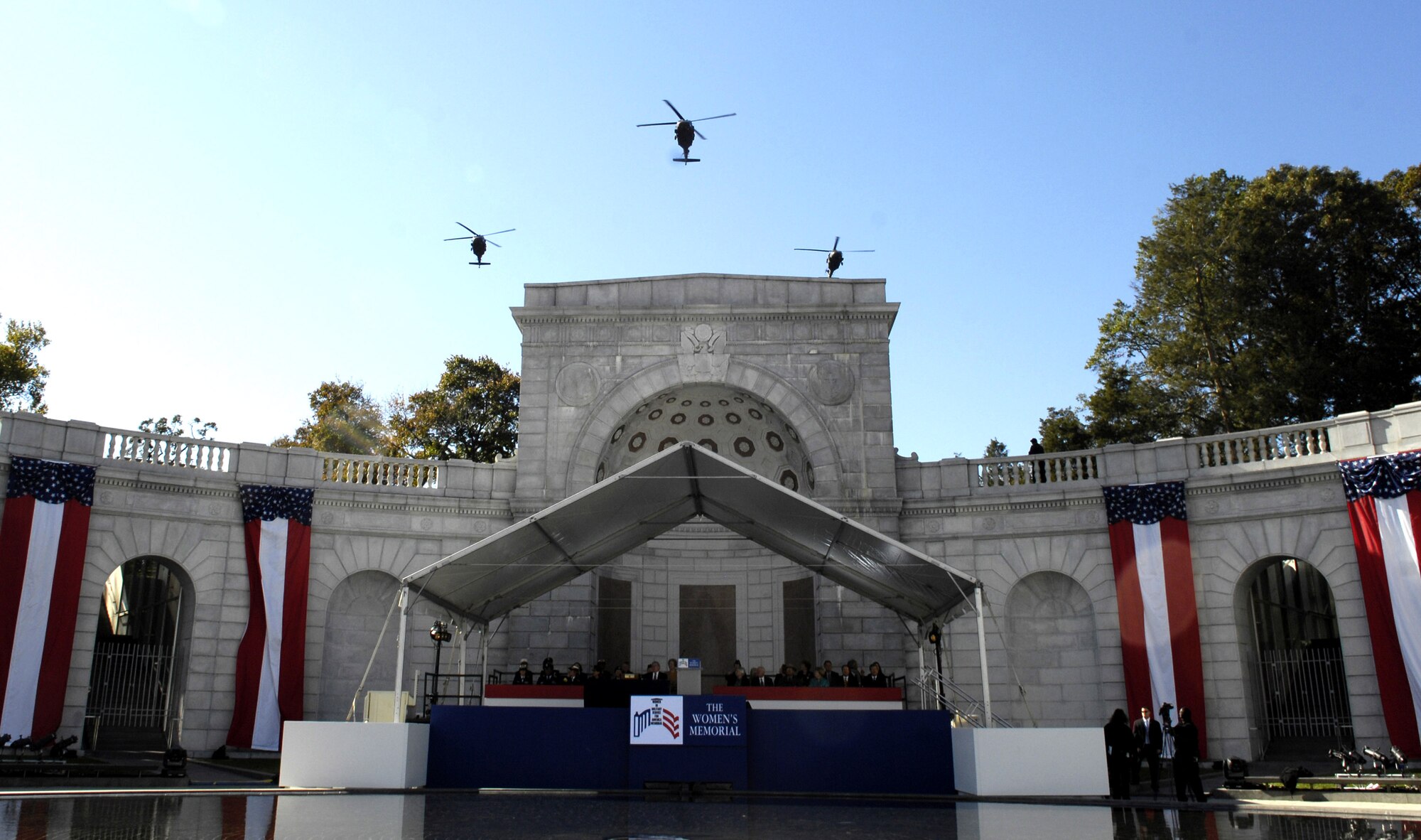 U.S. Army helicopters fly overhead during the ceremony Nov. 3 celebrating the 10th anniversary of the Women in Military Service for America Memorial at Arlington National Cemetery.  The helicopter pilots were all female and assigned to the 12th Aviation Battalion at Fort Belvoir, Va. (DOD photo/Cherie A. Thurlby)