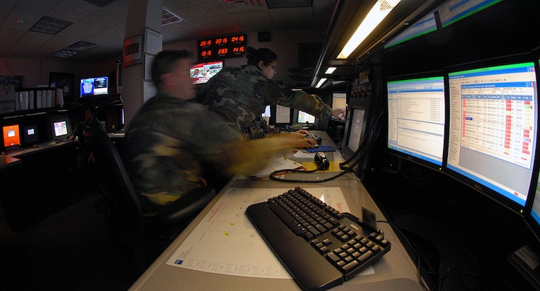 375th Airlift Wing Command Post personnel monitor the "heartbeat" of the base as they conduct 24 hour a day control room activities.