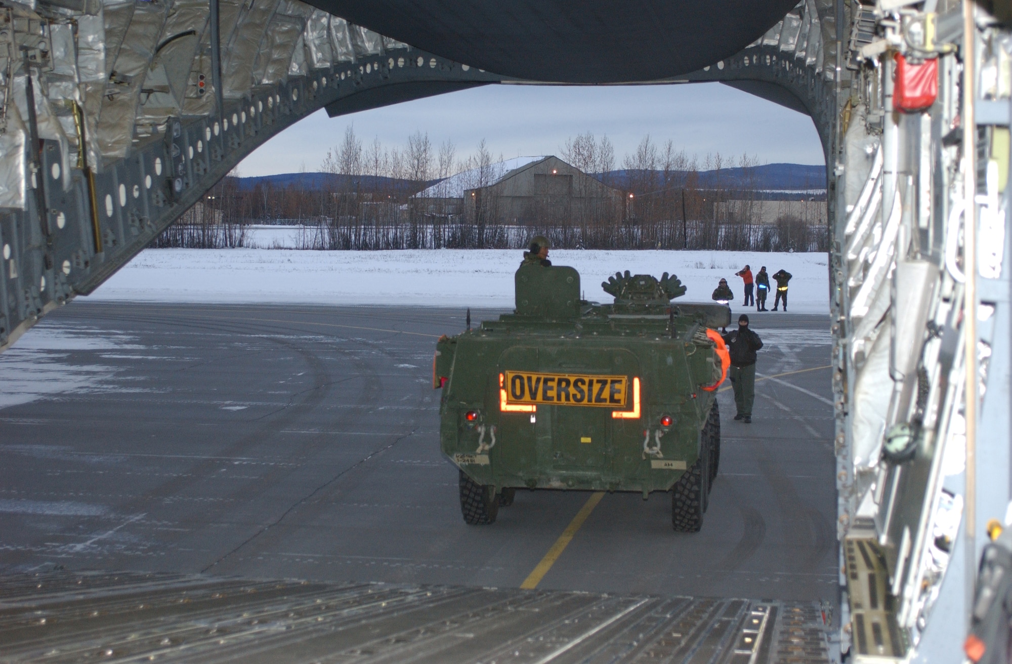 ELMENDORF AIR FORCE BASE, Alaska-- A Stryker is loaded into a C-17 aircraft during a deployment exercise with Soldiers from 1st Battalion, 24th Infantry Regiment, 1st Stryker Brigade Combat Team, 25th Infantry Division, at Eielson Air Force Base Oct. 30. (U.S. Army photo by Spc. Vincent Fusco) (Released)