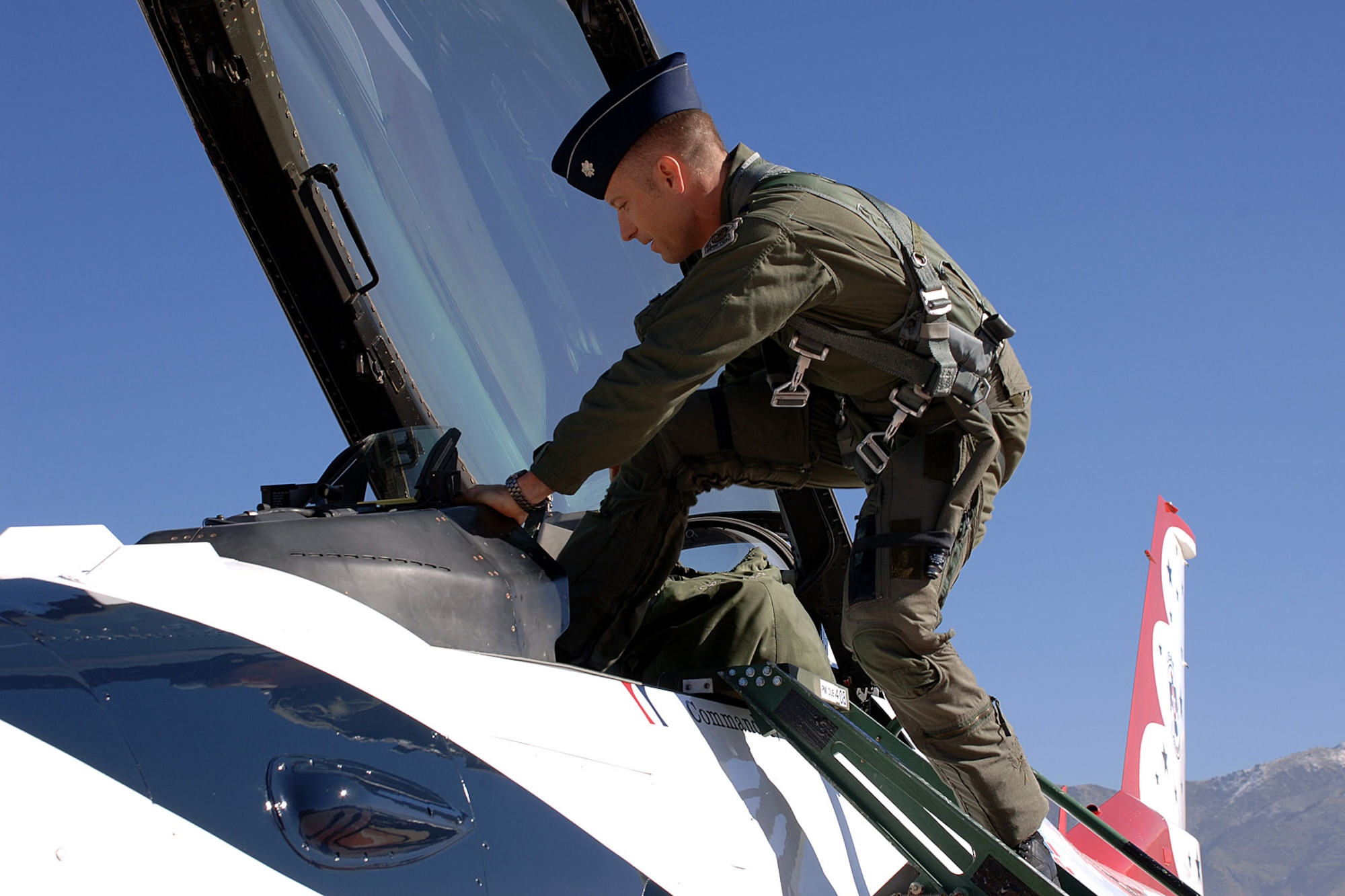 Lt. Col. Greg Thomas climbs into his newly upgraded F-16 Fighting Falcon Oct. 24 at Hill Air Force Base, Utah.  Eleven of the upgraded aircraft are destined for the U.S. Air Force Thunderbirds aerial demonstration team and are slated for delivery for the 2009 show season.  Colonel Thomas is the incoming 2008-2009 Thunderbird commander and lead pilot.  (U.S. Air Force photo/Alex R. Lloyd)