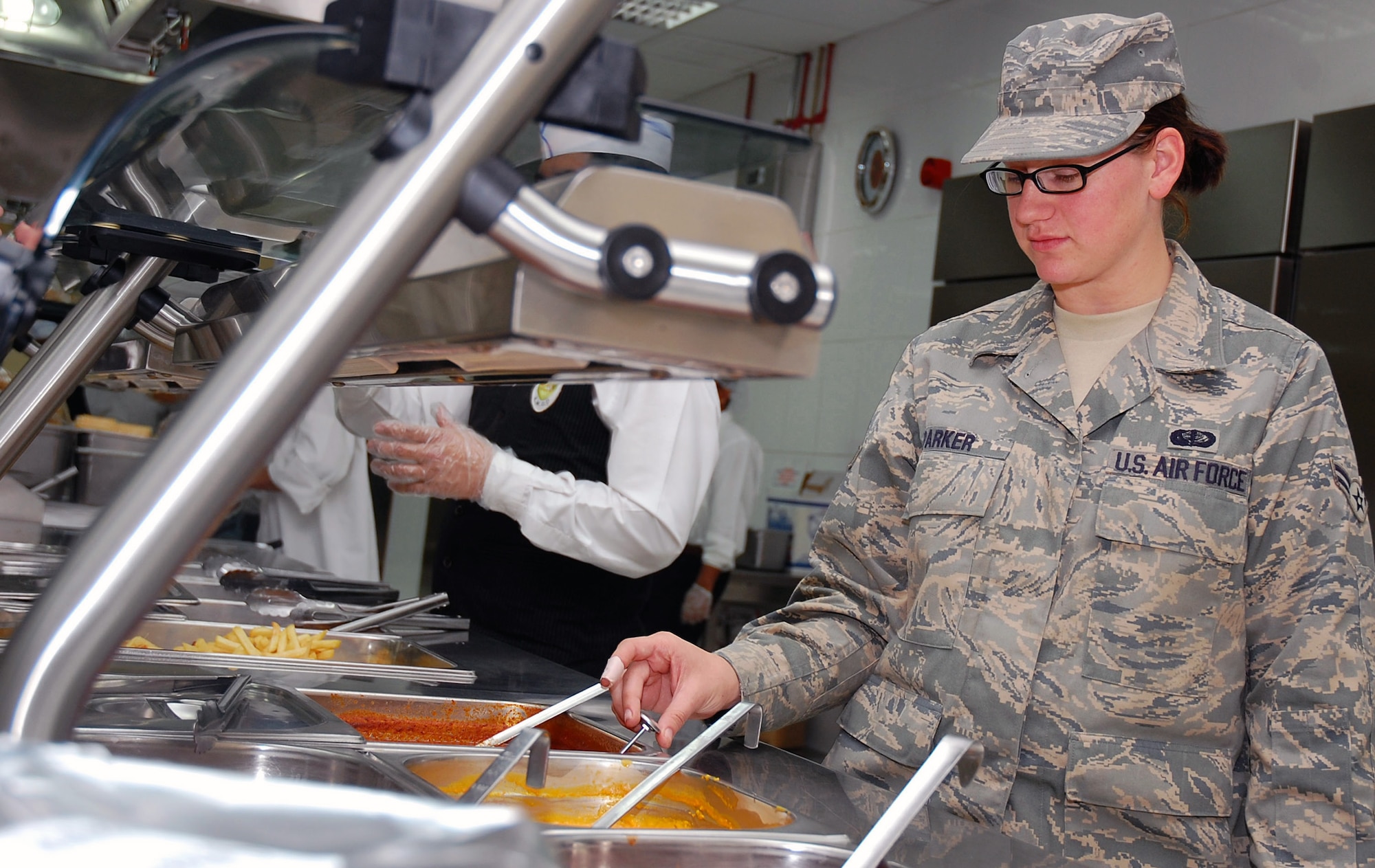 Airman 1st Class Katherine Parker, 386th Expeditionary Services Squadron food services specialist, performs a quality assurance temperature check Nov. 2 here. Airman Parker is deployed from Minot Air Force Base, N.D. (U.S. Air Force photo/Staff Sgt. Tia Schroeder)
