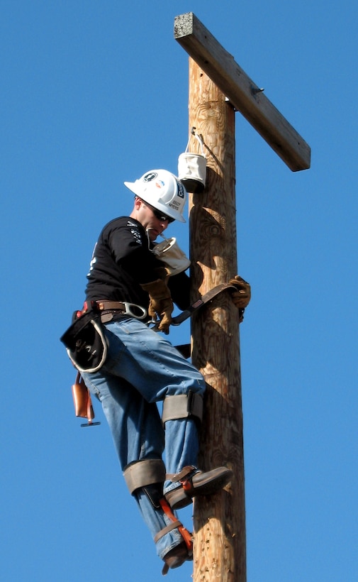 Staff Sgt. Randy Myers, an electrical systems instructor with the 366th Training Squadron, competes in the Pole Climb event at the 24th Annual International Lineman's Rodeo and Expo at Overland Park, Kan., Oct 27. The Sheppard team placed second in the military category. (Photo courtesy of Major Majken Tutty)