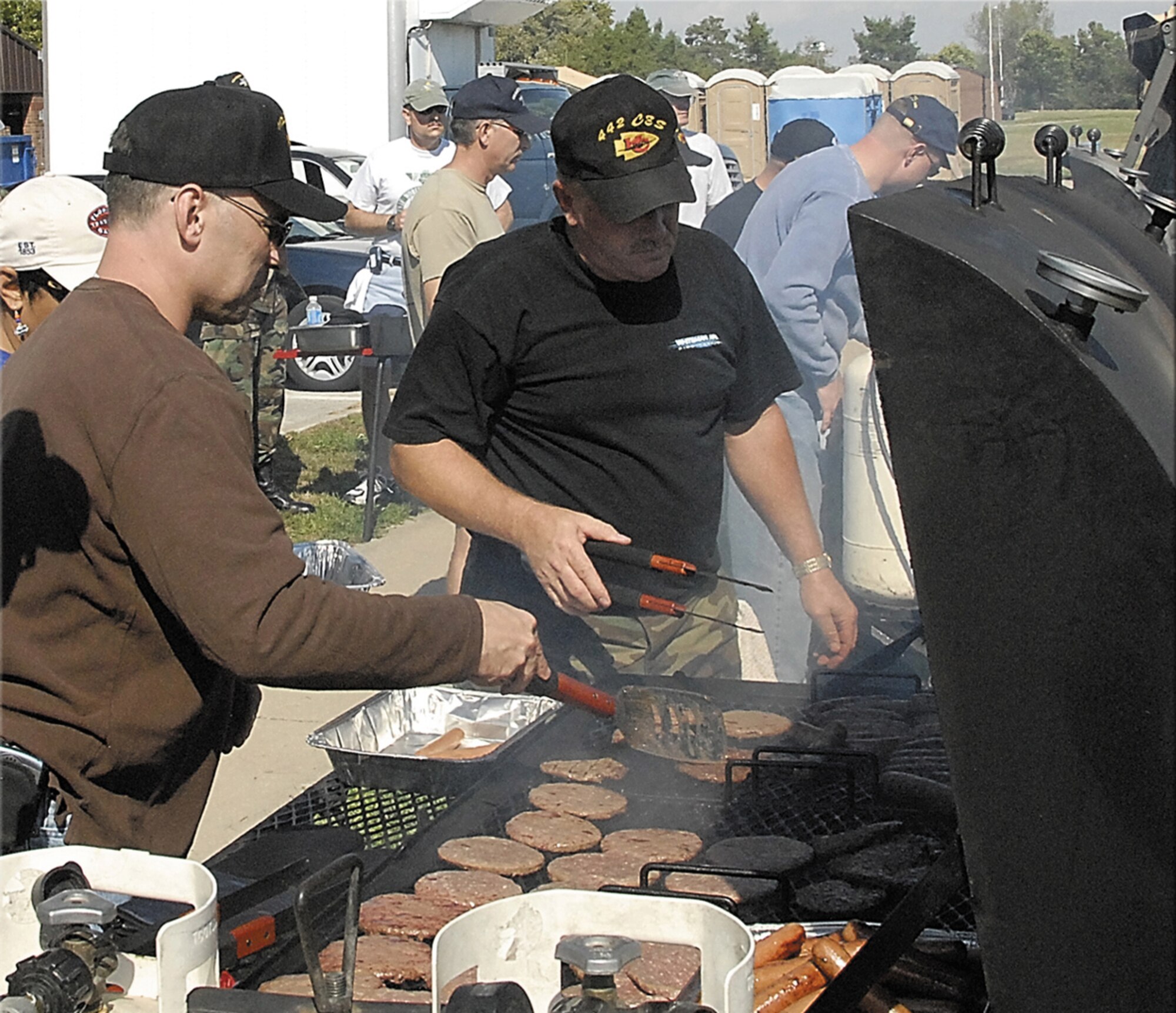 At the 442nd Fighter Wing's Family Appreciation Day, food preparation was a non-stop effort as Wing members and their families enjoyed  burgers, brats, beans and other fare Oct. 14, 2007. The 442nd Fighter Wing is an Air Force Reserve Command A-10 Thunderbolt II unit based at Whiteman AFB, Mo. (US Air Force photo/Master Sgt. John Vertreese)