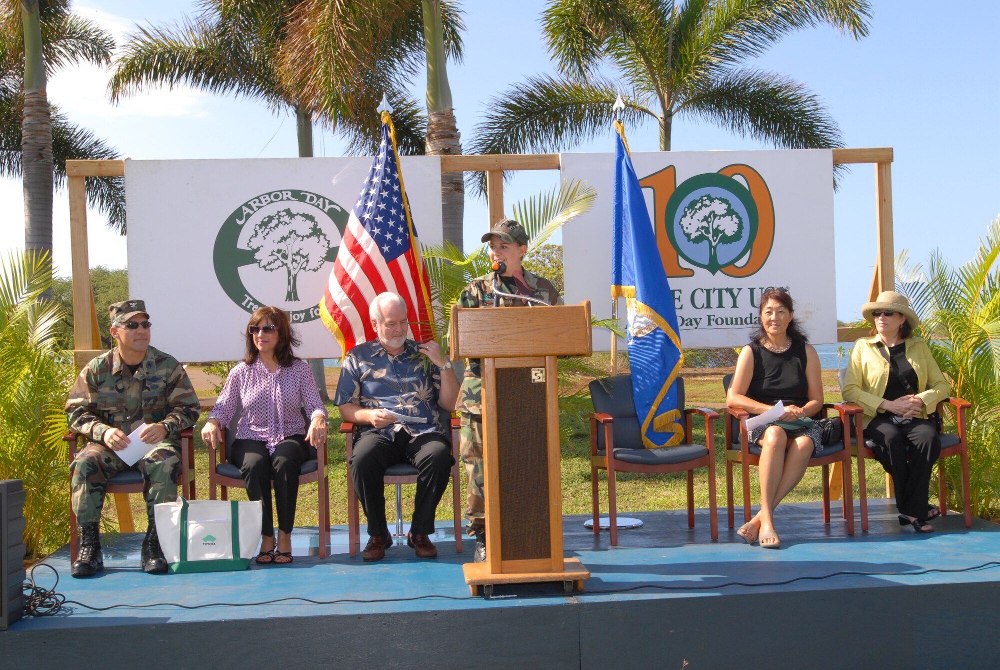 2nd Lt. Alison Freiman, 15th Civil Engineer Squadron speaks to elementary school students about Arbor Day before inroducing Col. JJ Torres, 15th Airlift Wing commander and his wife, Mrs. Irene Torres. 