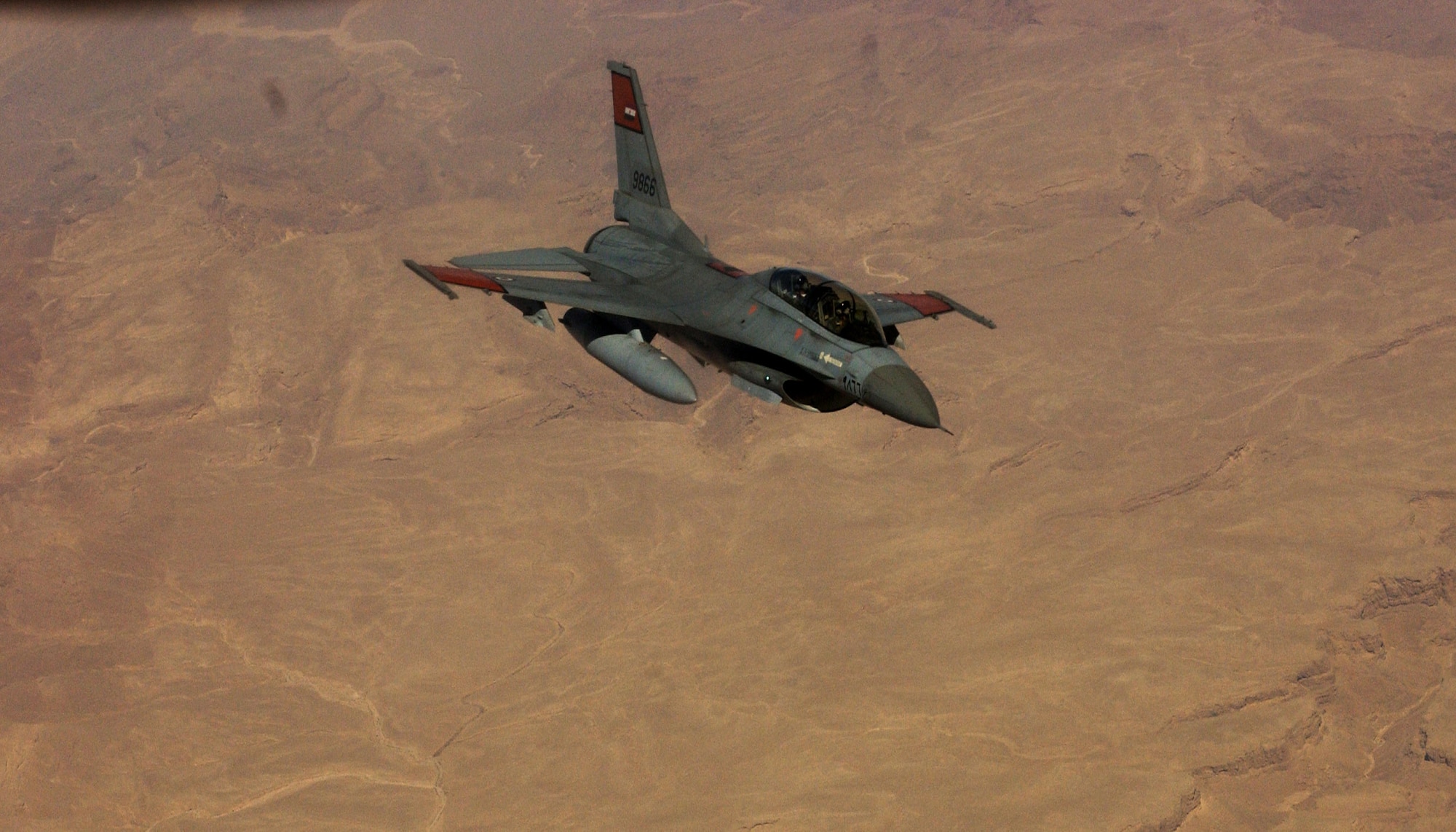An Egyptian air force F-16 Fighting Falcon prepares to make contact with a KC-135 Stratotanker from March Air Reserve Base, Calif., during in-flight refueling training.  A contingent of reservists from the 336th Air Refueling Squadron at March ARB are providing aerial refueling training for Egyptian pilots.   (U.S. Air Force photo/Staff Sgt. Amy Abbott)