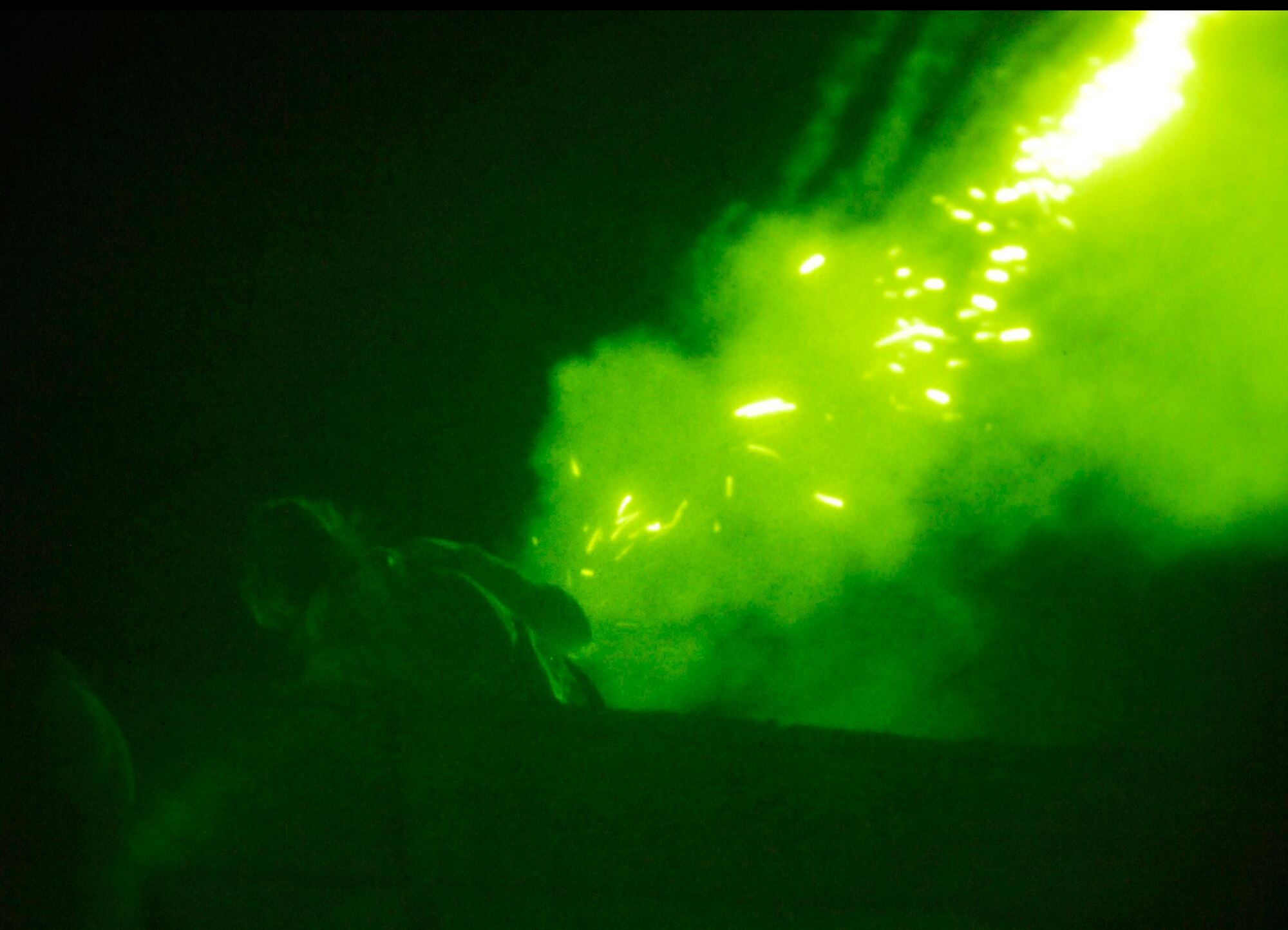 An Air Force member portraying an enemy sniper launches flares during a night engagement to simulate heavy machine gun fire as part of exercise Atlantic Strike VI, a semi-annual training event sponsored by U.S. Central Command Air Forces at the Avon Park Air Ground Training Complex in Avon Park, Fla.  The intense Atlantic Strike training scenarios are aimed at preparing Joint Terminal Attack Controllers and Army Joint Fires Observers for urban close air support operations prior to deployment to Iraq and Afghanistan.  Atlantic Strike battles continue through 9 Nov. (U.S. Air Force Photo By Airman 1st Class Stephenie Wade)