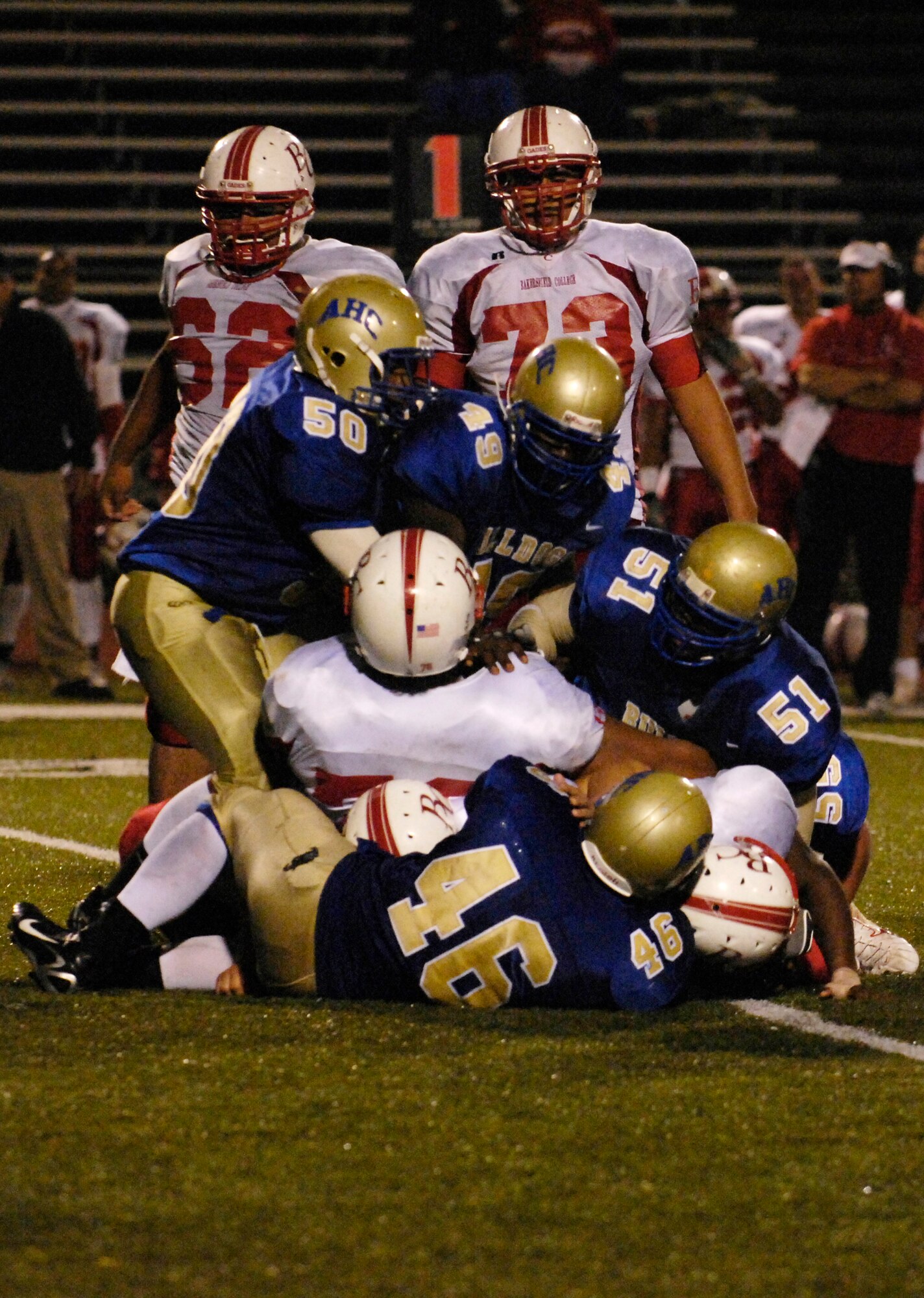 Santa Maria, Calif. -- The Allan Hancock College Bulldogs compete against the Bakersfield College Renegades at the 5th annual military appreciation night on November 3, 2007. The game resulted in a 23-36 loss for the Bulldogs. Military appreciation night was held for all military members who have made sacrifices to protect their country. The first 250 military members, veterans and their families were admitted at no charge and served a free tri-tip dinner. The Santa Maria Valley Chamber of Commerce, Coast Hills Federal Credit Union, and Allan Hancock College sponsored the special event. (U.S. Air Force photo/Airman 1st Class Christian Thomas)
