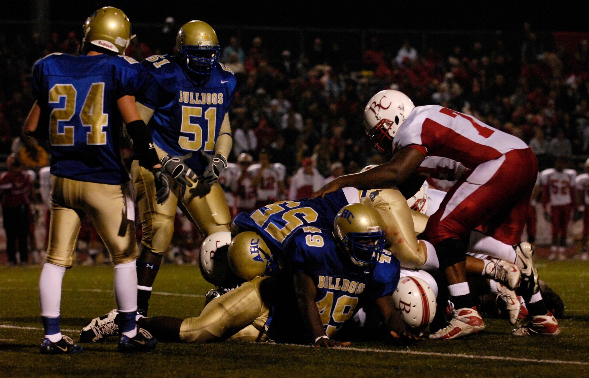 Santa Maria, Calif. -- The Allan Hancock College Bulldogs compete against the Bakersfield College Renegades at the 5th annual military appreciation night on November 3, 2007. The game resulted in a 23-36 loss for the Bulldogs. Military appreciation night was held for all military members who have made sacrifices to protect their country. The first 250 military members, veterans and their families were admitted at no charge and served a free tri-tip dinner. The Santa Maria Valley Chamber of Commerce, Coast Hills Federal Credit Union, and Allan Hancock College sponsored the special event. (U.S. Air Force photo/Airman 1st Class Christian Thomas)
