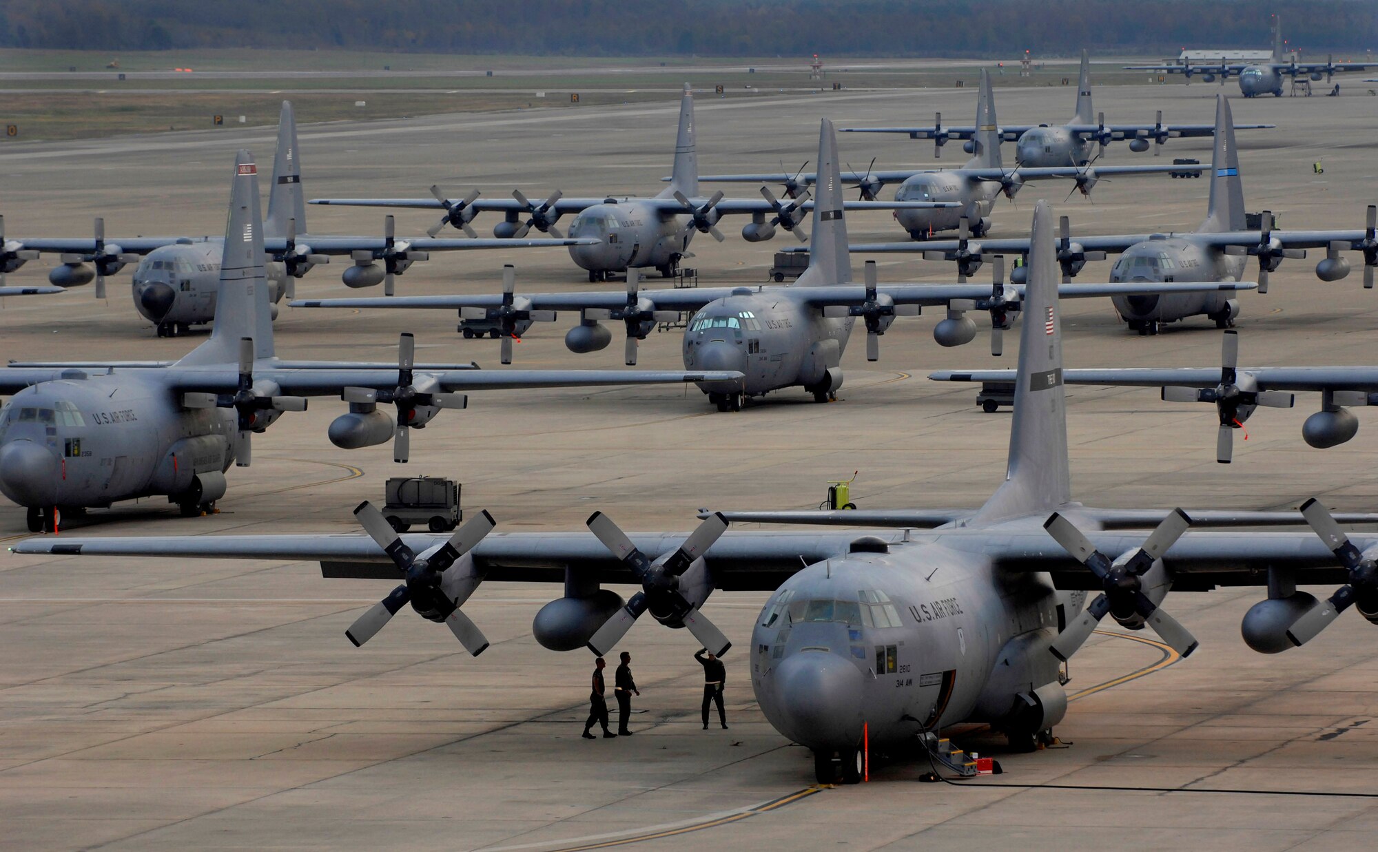 A crew performs pre-flight checks on a C-130 Hercules moments before a scheduled take off at Little Rock Air Force Base, Ark., Nov. 1. (U.S. Air Force photo/Tech. Sgt. Larry A. Simmons) 
