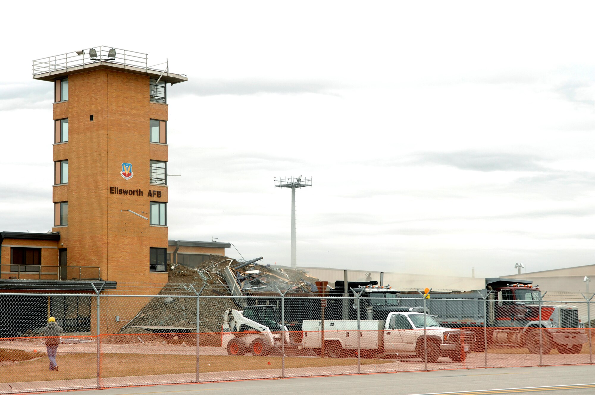 The top of the old Base Operations building at Ellsworth Air Force Base, S.D., is removed during demolitions, Oct. 26, 2007.  This facility was replaced by an 8.8 million dollar U.S. Army Corps of Engineers construction project.  (U.S. Air Force photo by SSgt Michael B. Keller)