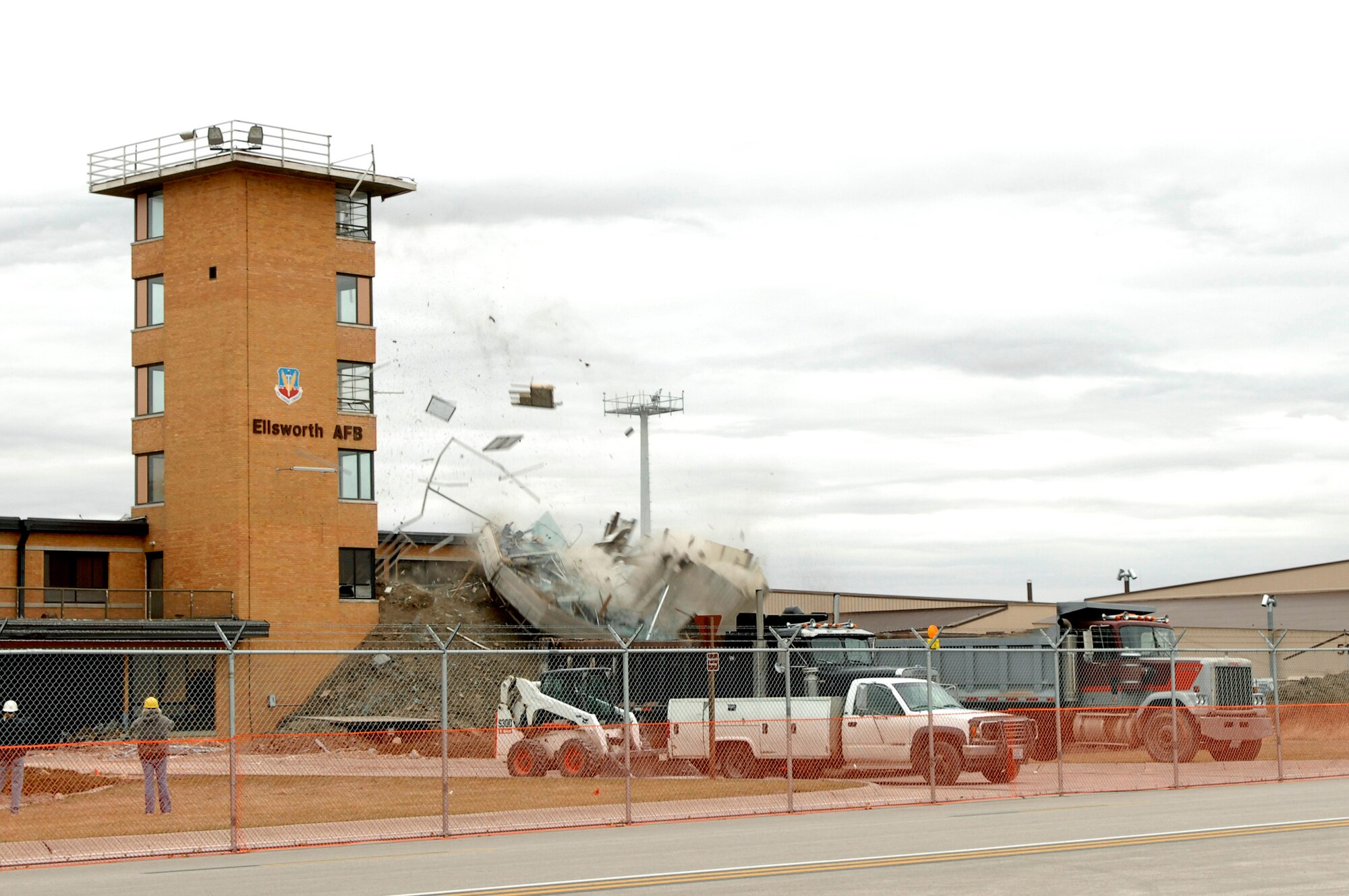 The top of the old Base Operations building at Ellsworth Air Force Base, S.D., is removed during demolitions, Oct. 26, 2007.  This facility was replaced by an 8.8 million dollar U.S. Army Corps of Engineers construction project.  (U.S. Air Force photo by SSgt Michael B. Keller)