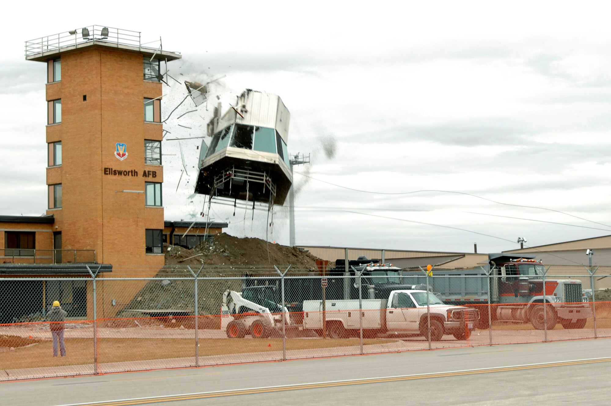 The top of the old Base Operations building at Ellsworth Air Force Base, S.D., is removed during demolitions, Oct. 26, 2007.  This facility was replaced by an 8.8 million dollar U.S. Army Corps of Engineers construction project.  (U.S. Air Force photo by SSgt Michael B. Keller)