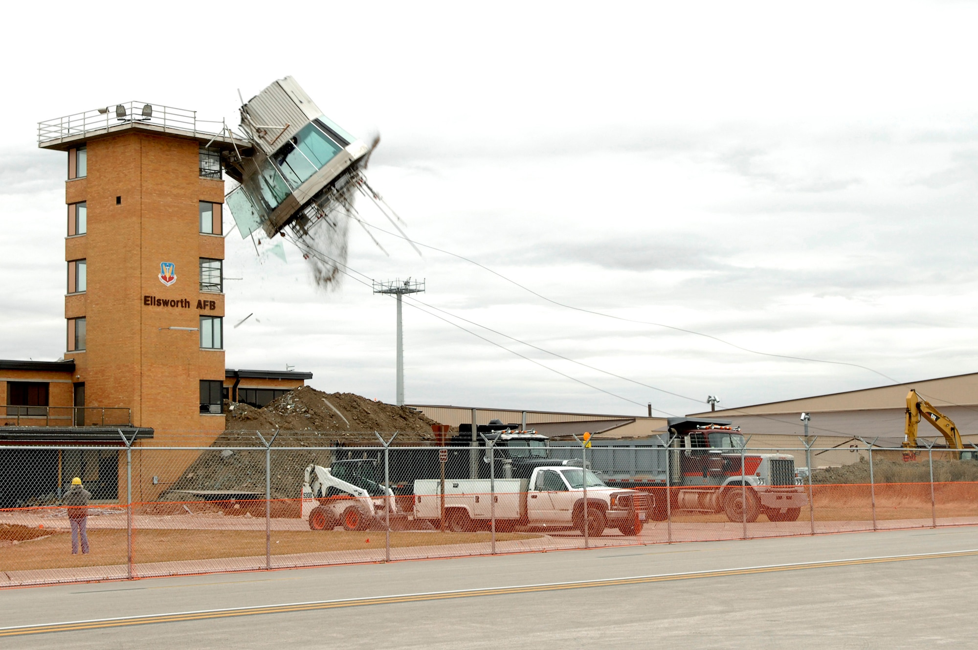 The top of the old Base Operations building at Ellsworth Air Force Base, S.D., is removed during demolitions, Oct. 26, 2007.  This facility was replaced by an 8.8 million dollar U.S. Army Corps of Engineers construction project.  (U.S. Air Force photo by SSgt Michael B. Keller)