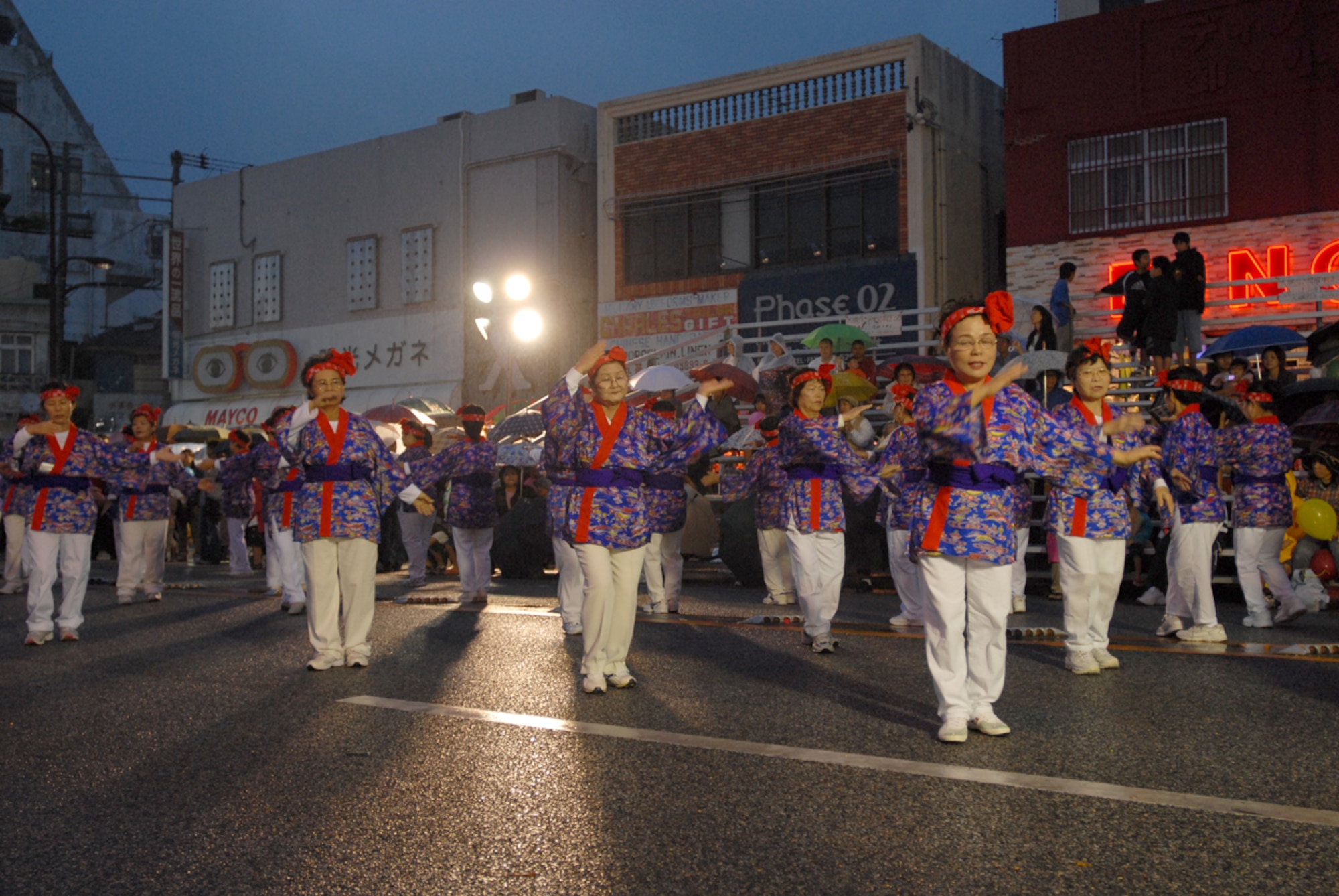The Okinawa City Women’s Federation group performs the “Ah-chabira” dance during the carnival’s parade Nov. 4. Dozens of groups performed during the parade, showcasing a variety of international cultures.
(U.S. Air Force/Airman 1st Class Kasey Zickmund)