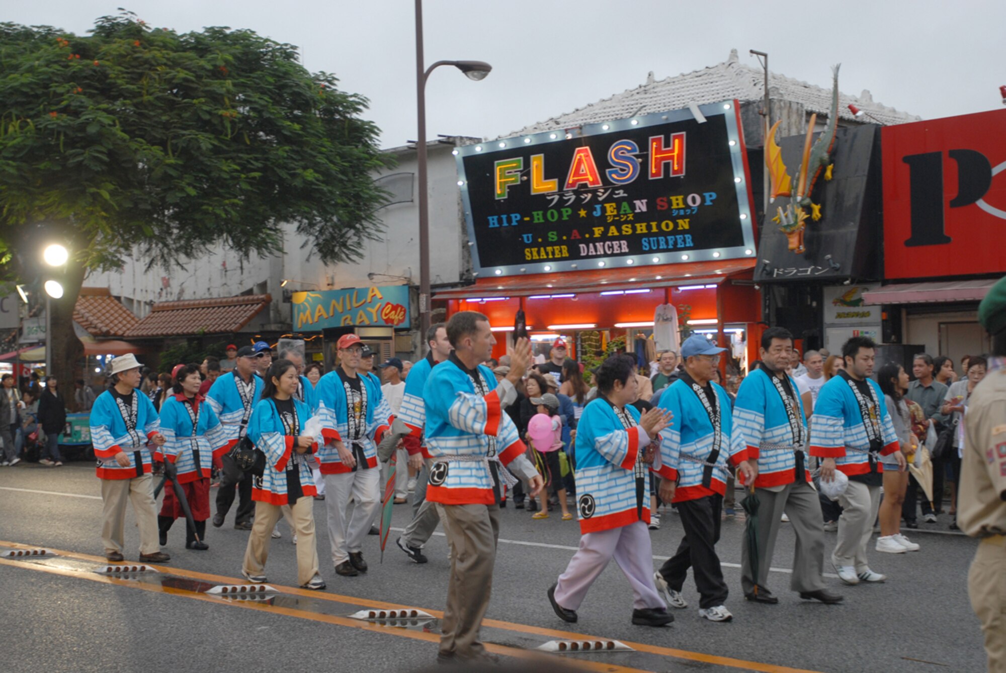 Okinawa City Leaders and 18th Wing leaders march together during the Okinawa City International Carnival parade Nov. 4. The carnival aims to bring people together and stimulate local industries, while creating a “cosmopolitan cultural tourism city” through music, traditional entertainment, and sporting events. Approximately 2,000 people participated in a tug-of-war, which was the highlight of the carnival. The east side beat the west in the tug-of-war competition.
(U.S. Air Force/Airman 1st Class Kasey Zickmund)