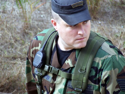 Tech. Sgt. Greg Hasecuster, from the U.S. Air Force Expeditionary Center's 421st Combat Training Squadron at Fort Dix, N.J., watches a scenario for Air Force Exercise Eagle Flag 08-1 at Naval Air Engineering Station Lakehurst, N.J., Oct. 20, 2007.  Sergeant Hasecuster is an instructor for finance Airmen participating in the exercise.  (U.S. Air Force Photo/Tech. Sgt. Scott T. Sturkol)