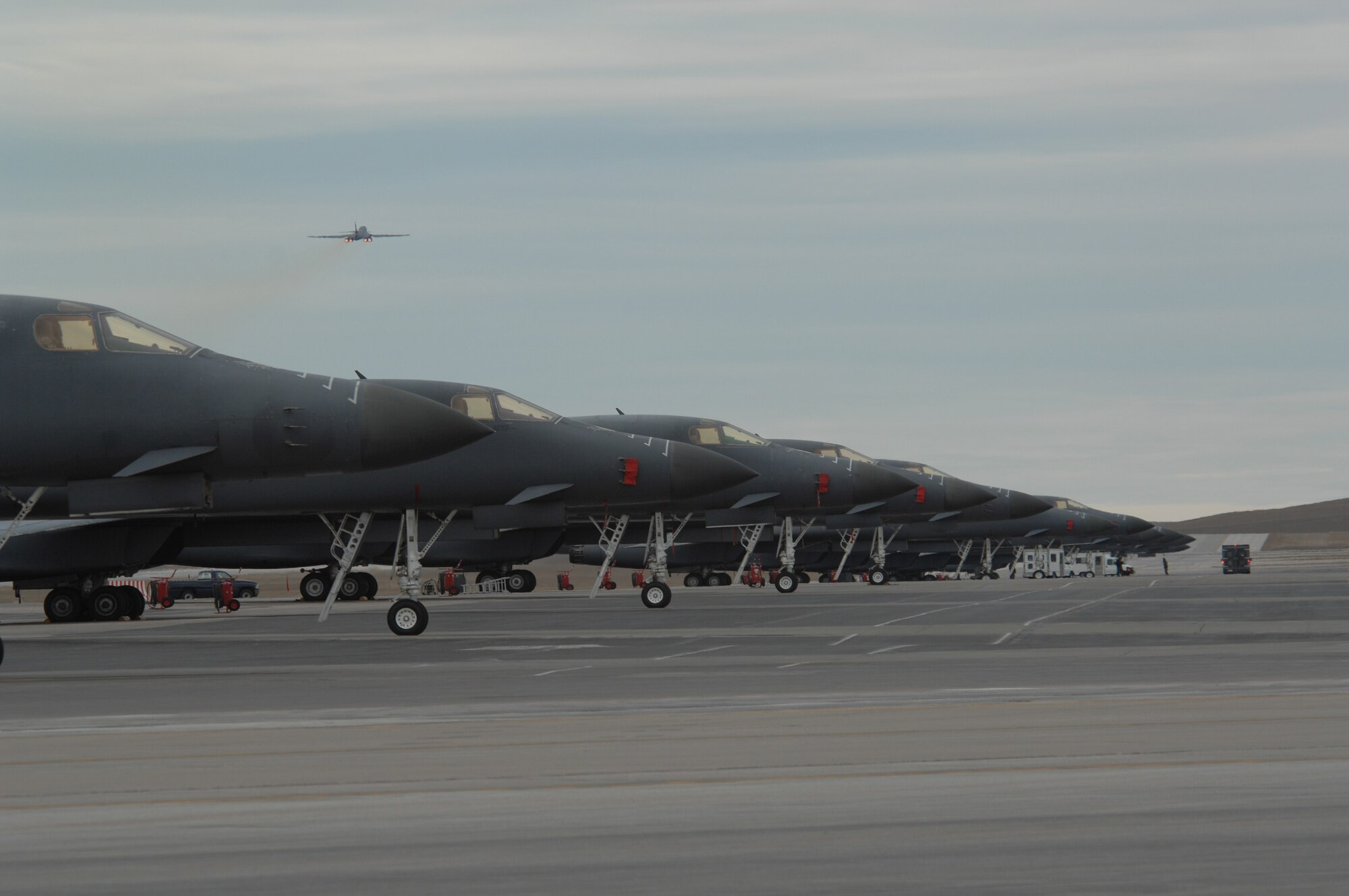 Twenty B-1 Bombers from Dyess Air Force Base, Texas, lined up on the Ellsworth AFB flight line Nov. 7 in preparation for their departure back to Texas. The aircraft were temporarily relocated to Ellsworth in September, while the 6,600 feet of the Dyess flightline was under construction. Ellsworth was chosen out of more than 10 sites as it was the most cost effective. (U.S. Air Force photo by Airman First Class Anthony Sanchelli)