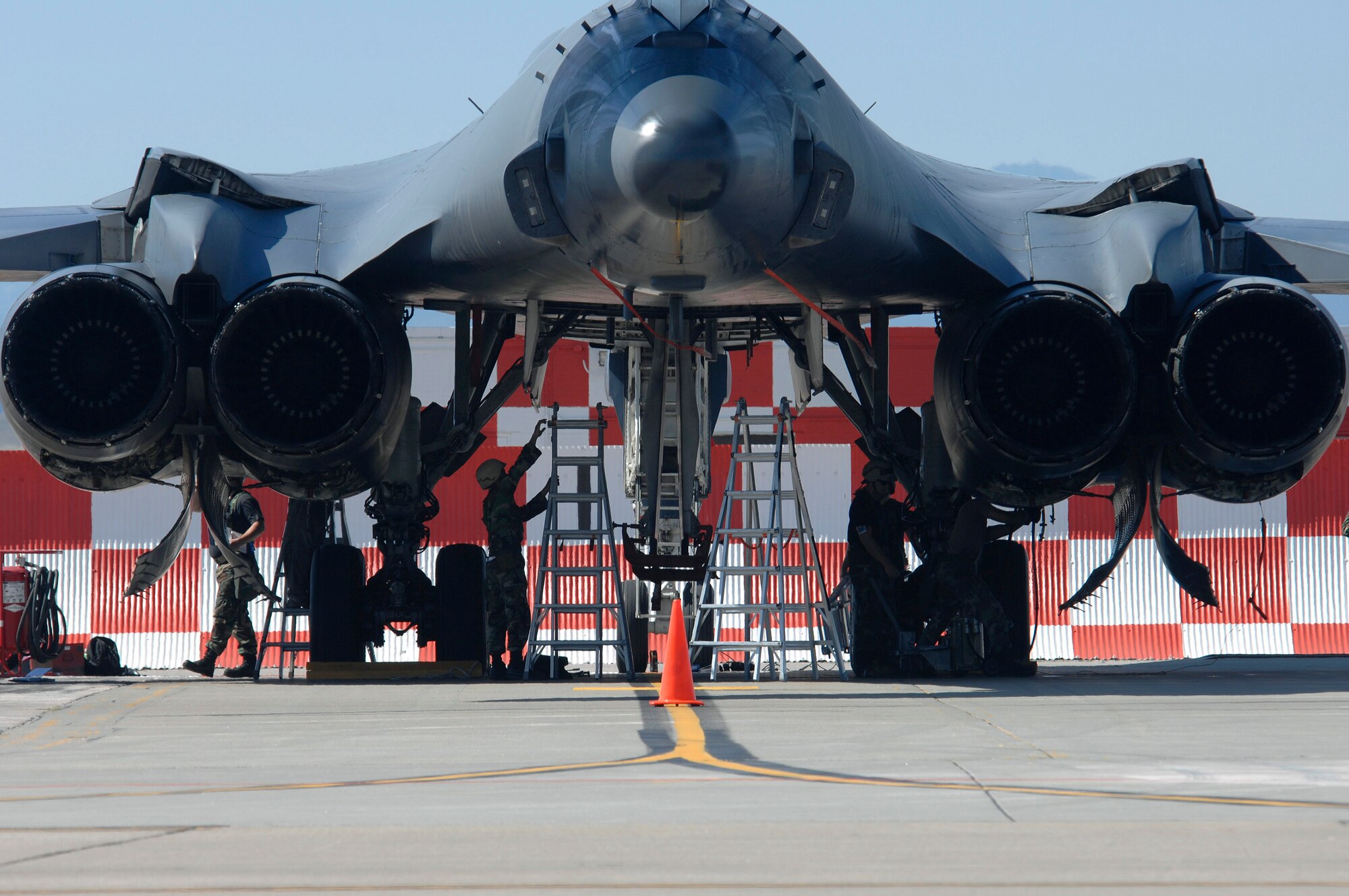 U.S. Air Force Airmen from the 28th Bomb Wing work on a B-1B Lancer during Badlands Express 07-06, an Operational Readiness Exercise (ORE), at Ellsworth Air Force Base, S.D., Sept. 11, 2007.  Ellsworth is conducting this ORE in preparation for an upcoming Operational Readiness Inspection in November.  (U.S. Air Force photo by SSgt Michael B. Keller)(Released)